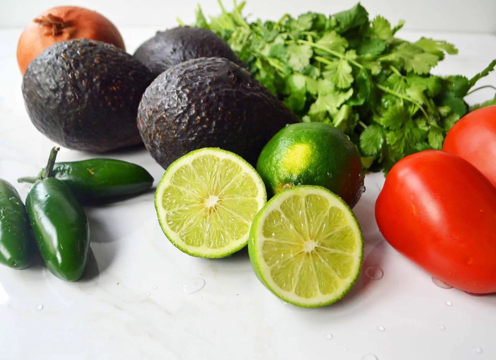 Cowboy Caviar. A popular, crowd-pleasing appetizer made with black beans, corn, tomatoes, cilantro, avocado, peppers, all tossed in a zesty dressing. www.modernhoney.com #cowboycaviar #appetizer #salsa #cornsalsa #blackbeansalsa #appetizers