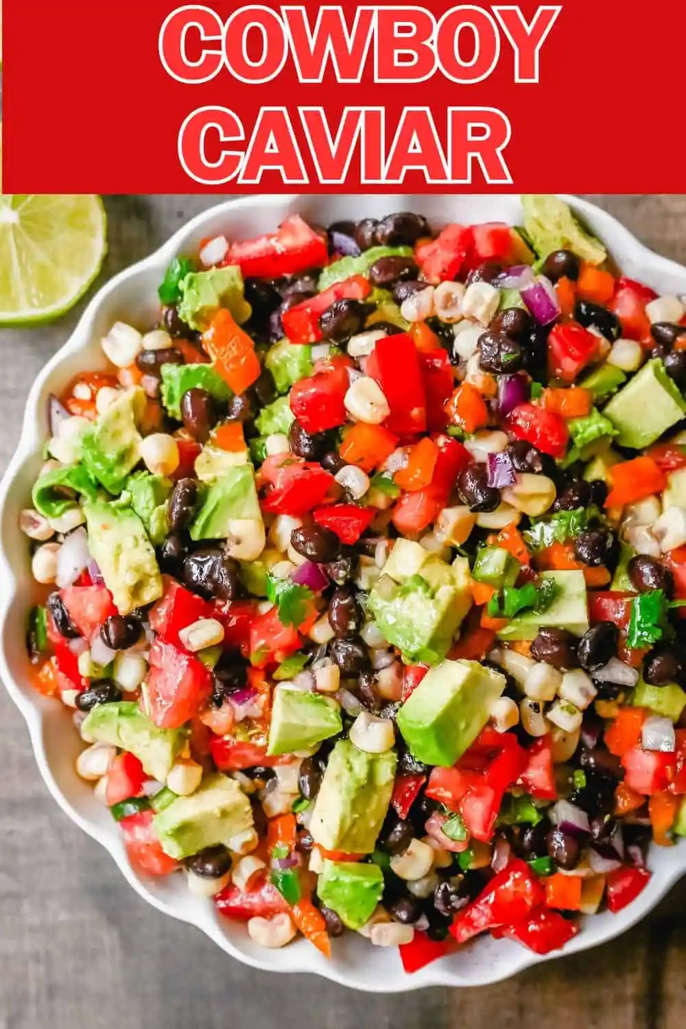 Cowboy Caviar. A popular, crowd-pleasing, fresh salsa appetizer made with black beans, corn, tomatoes, cilantro, avocado, peppers, all tossed in a zesty dressing.