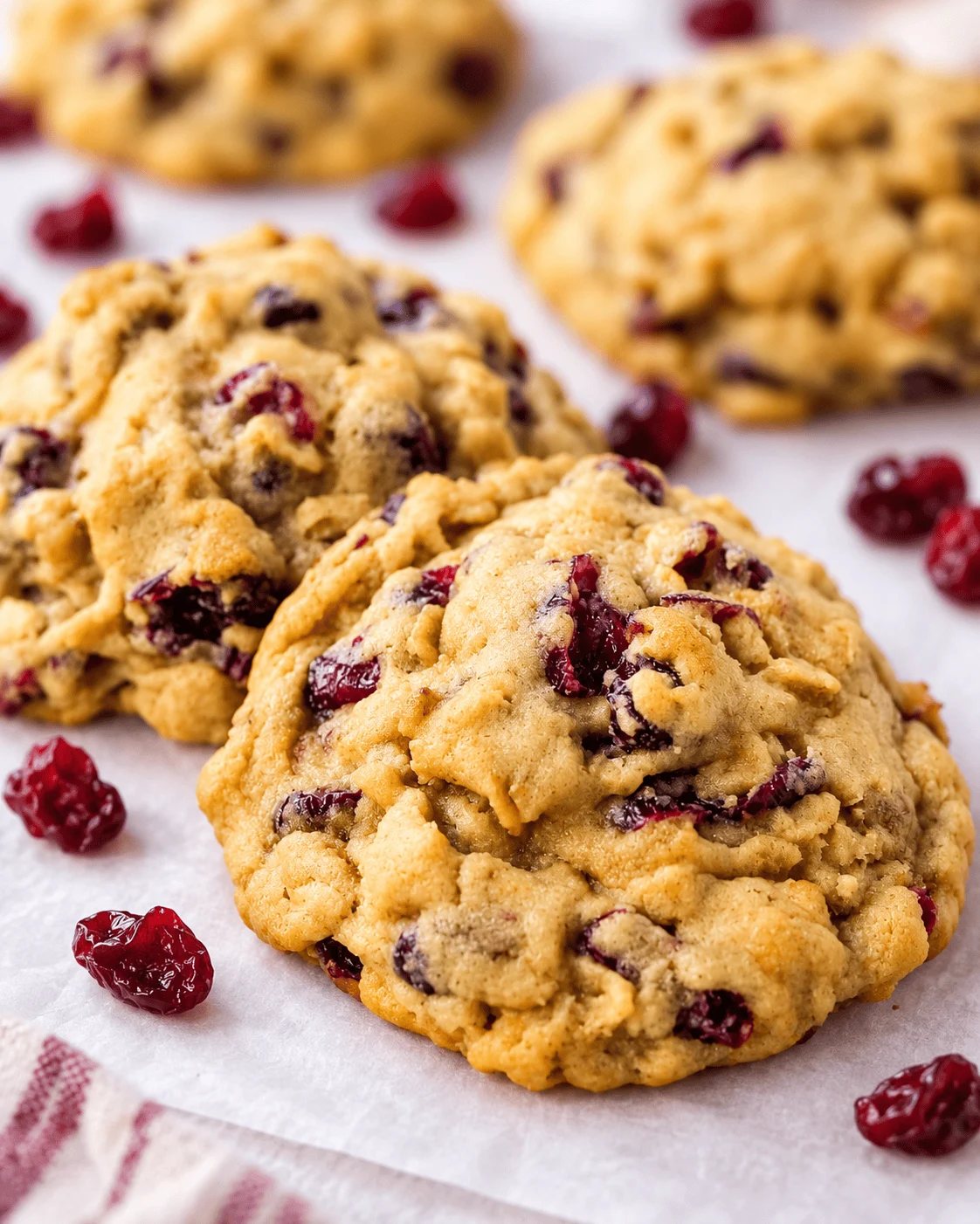 These soft and chewy cranberry oatmeal cookies are packed with sweetened dried cranberries and hearty oats, with a secret ingredient for the perfect texture. These are the best cranberry oatmeal cookies and always receive 5-star reviews.