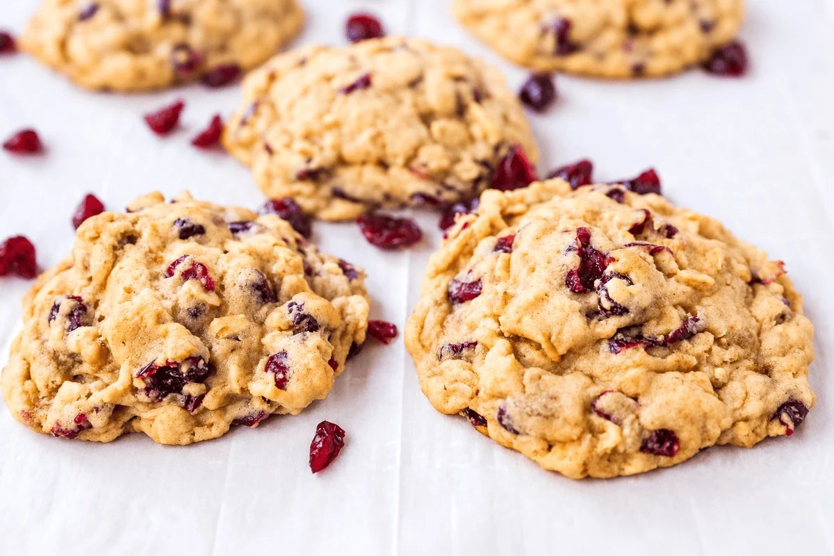 These soft and chewy cranberry oatmeal cookies are packed with sweetened dried cranberries and hearty oats, with a secret ingredient for the perfect texture. These are the best cranberry oatmeal cookies and always receive 5-star reviews.