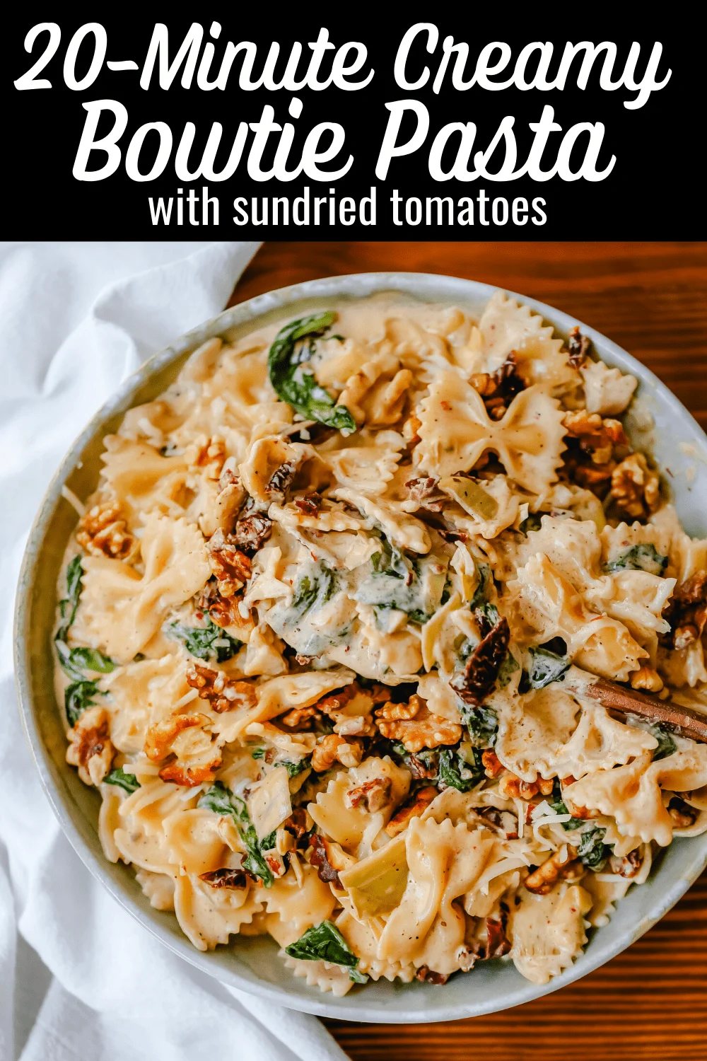 Creamy Bowtie Pasta with Sundried Tomatoes Bowtie Pasta tossed with a garlic sundried tomato cream sauce with artichoke hearts and parmesan cheese and crunchy toasted walnuts. A quick 20-minute weeknight meal. #pasta #dinner