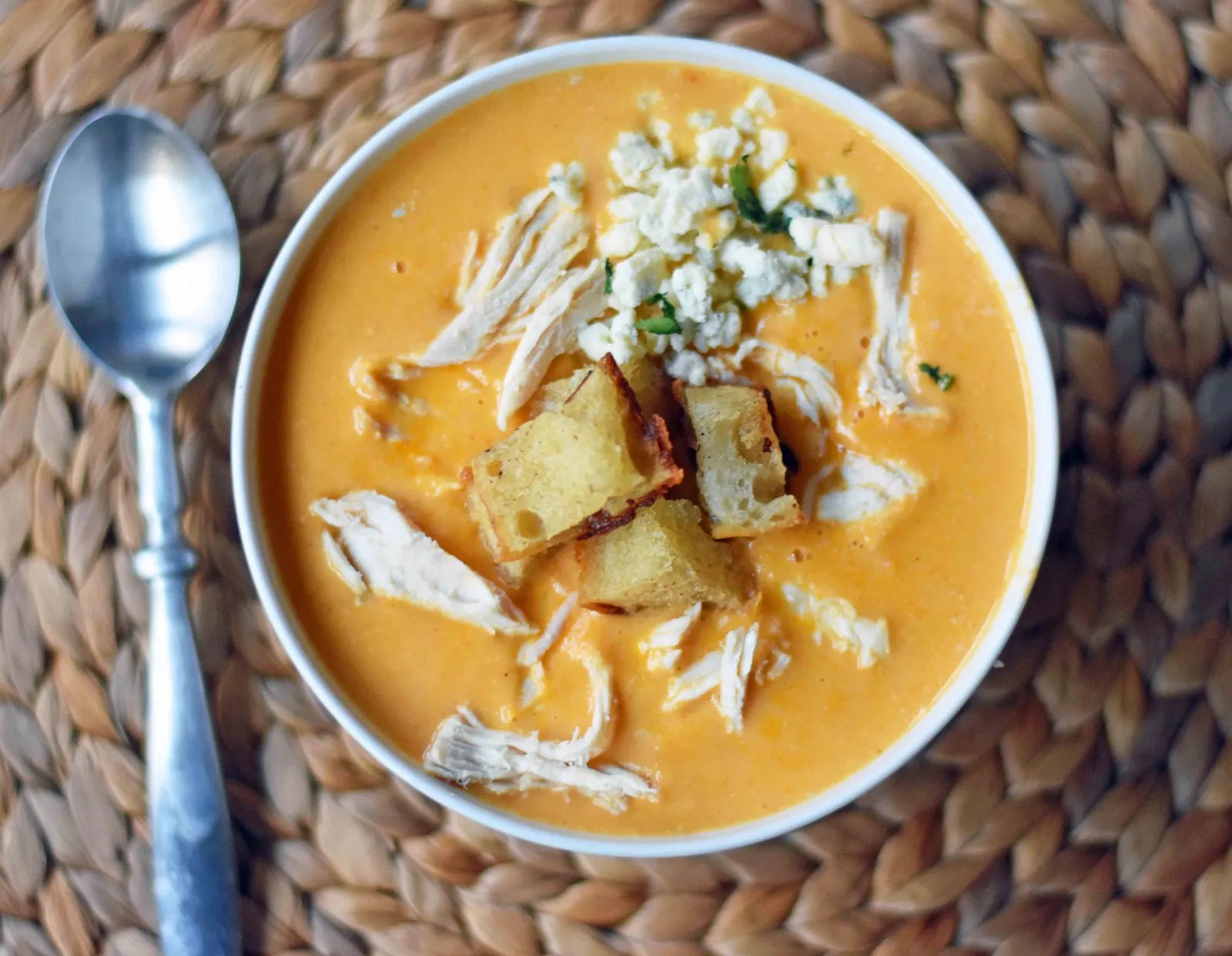 Creamy Buffalo Chicken Soup. All of the flavor of chicken wings in one soup. A tangy, creamy, and spicy buffalo chicken soup. www.modernhoney.com