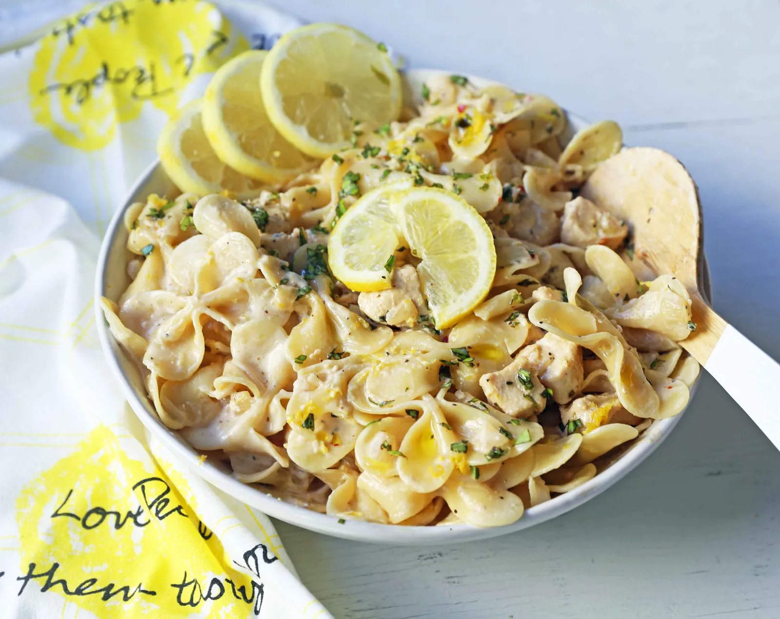 Creamy Lemon Chicken Pasta.Sauteed chicken in a rich creamy lemon basil sauce tossed with your favorite kind of pasta. A quick and easy 30-minute meal! www.modernhoney.com #lemonpasta #lemonchickenpasta #pasta #pastarecipes