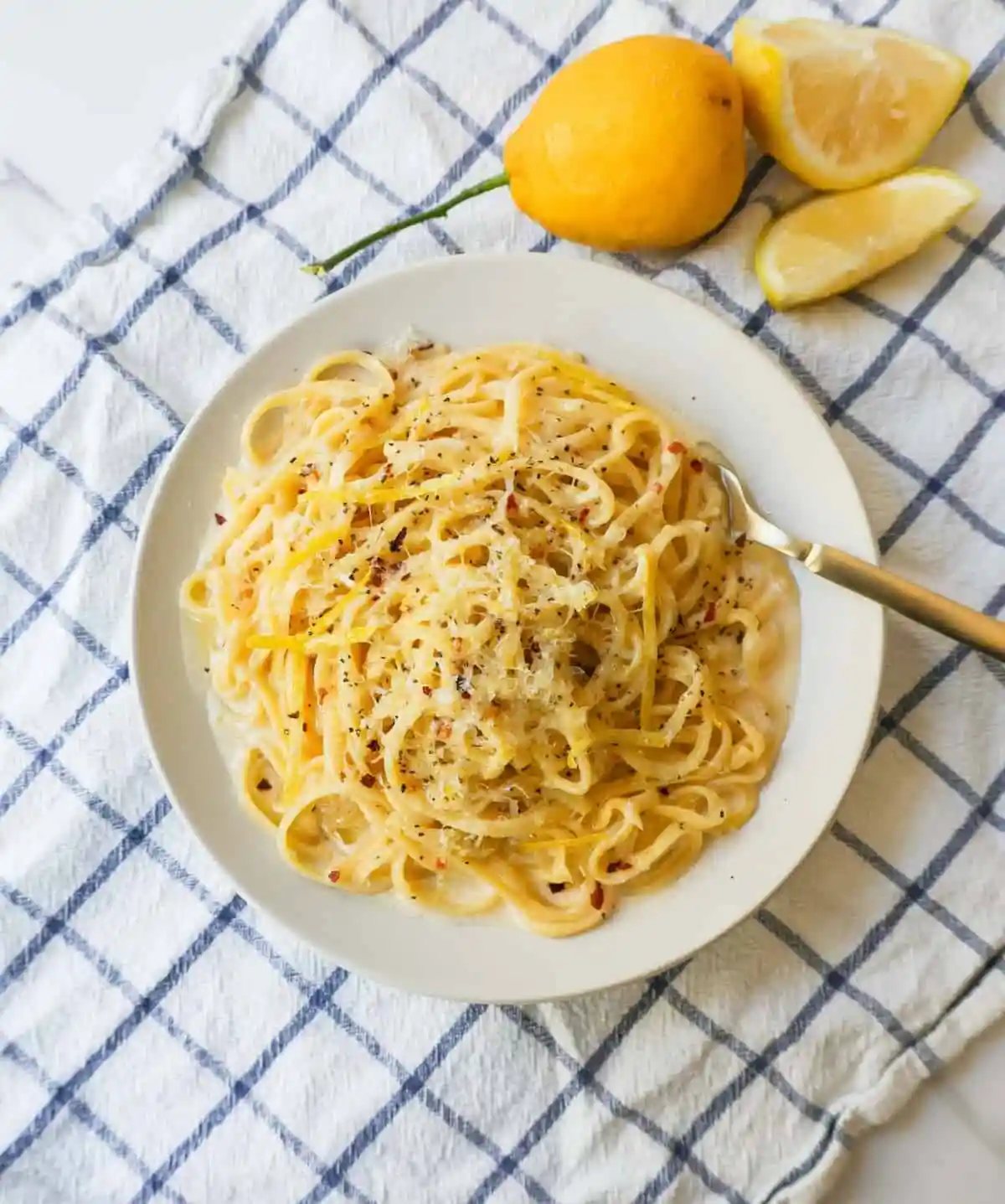 Creamy Lemon Pasta is made with fresh lemon, garlic, cream, butter, parmesan cheese, and spices and all tossed with your favorite type of pasta. A light and creamy sauce that highlights fresh lemons!