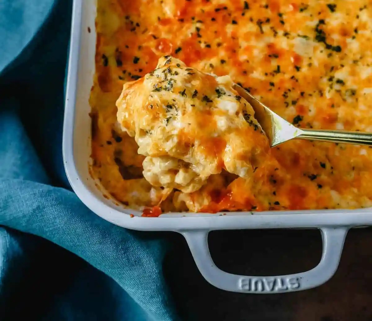 The Best Macaroni and Cheese is so cheesy with three types of cheese! How to make homemade mac n cheese at home. Tips and tricks for making creamy macaroni and cheese.