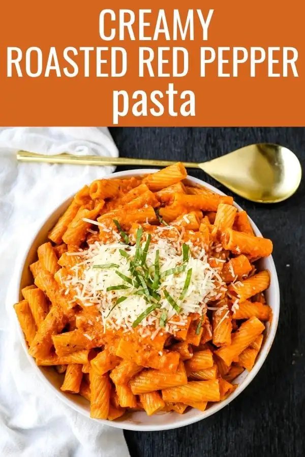 Creamy Roasted Red Pepper Pasta A creamy roasted red pepper and tomato basil sauce with garlic and heavy cream all tossed together with pasta and topped with parmesan cheese. A flavorful robust pasta dish! www.modernhoney.com #pasta #italian #italianfood