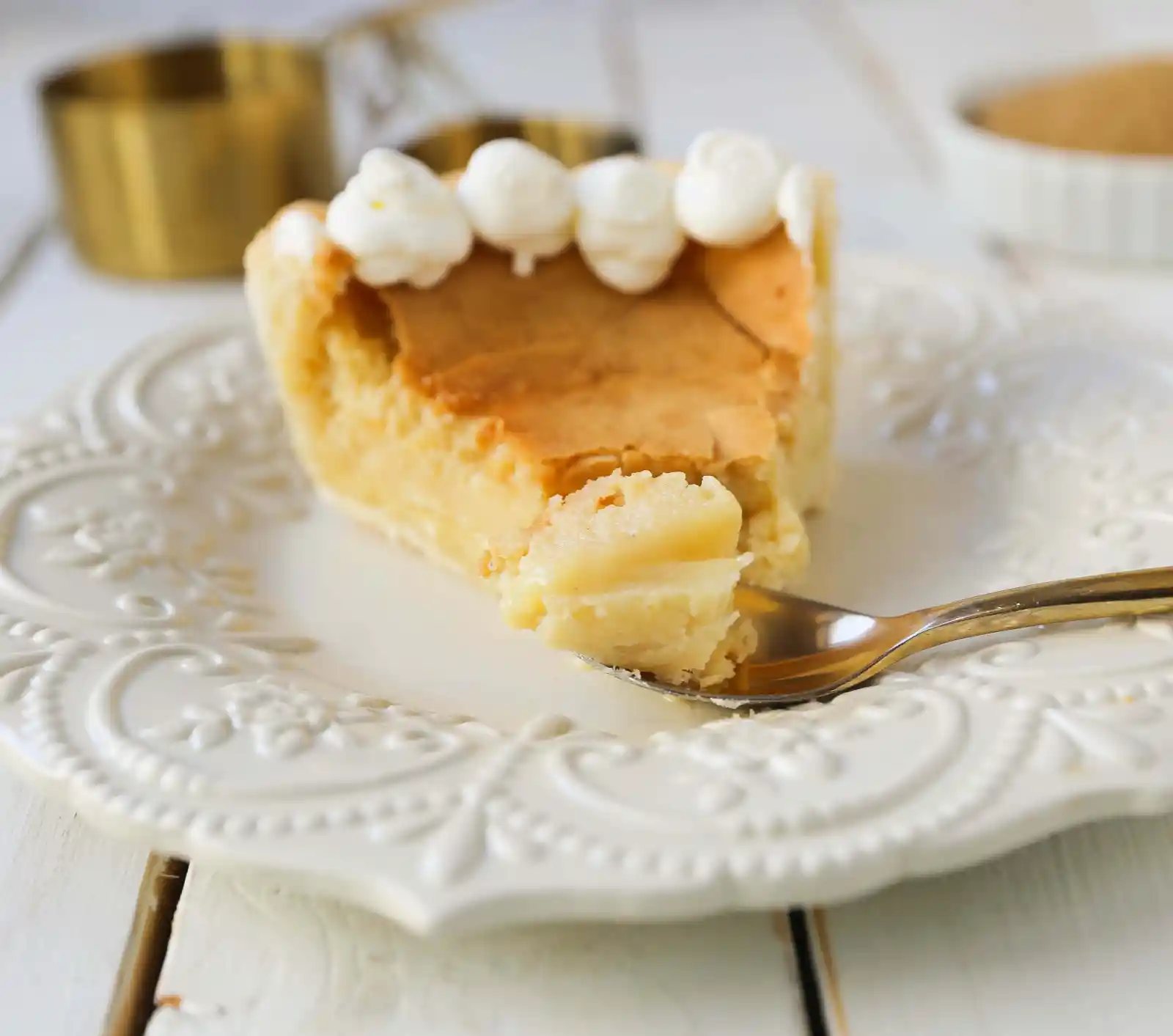Creme Brûlée Pie. A silky smooth vanilla custard in a buttery crust topped with a crisp sugar topping. It is a creamy sweet pie with a touch of tang and will be everyone's favorite pie! www.modernhoney.com #thanksgiving #pie #pies #thanksgivingrecipes #cremebrulee