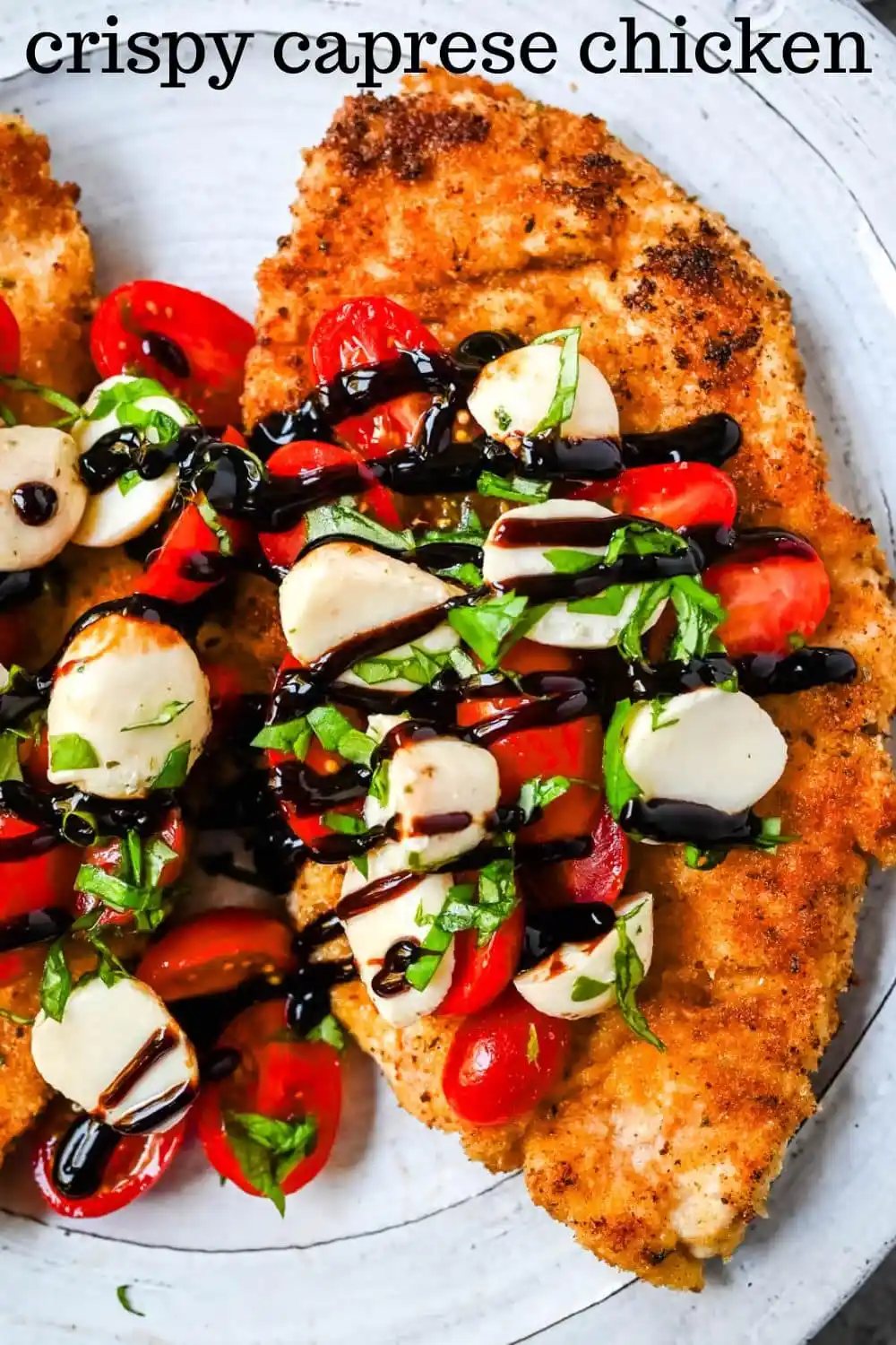 Crispy Caprese Chicken is crispy panko-crusted chicken topped with a fresh grape tomato and mozzarella caprese salad, finished with balsamic glaze. A simple, restaurant-worthy dinner ready in 30 minutes.