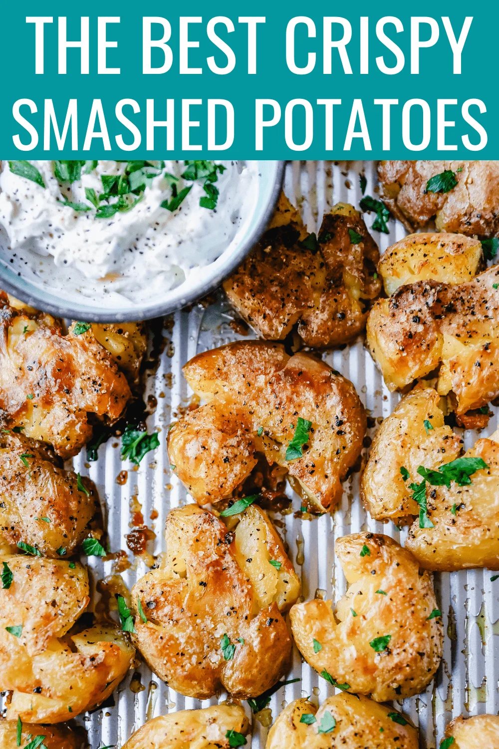 Crispy Smashed Potatoes. Crispy smashed potatoes with creamy, fluffy centers and crispy outsides. Petite potatoes topped with olive oil, salted butter, salt, and pepper and baked until crispy and topped with a garlic cheddar sour cream dip. The best smashed potatoes recipe!