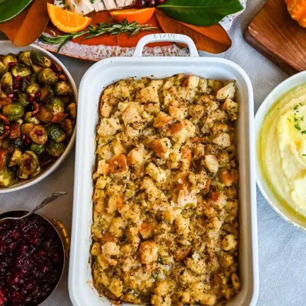 Classic Butter Herb Stuffing. How to make a foolproof, perfect, classic stuffing recipe with simple ingredients. This easy stuffing recipe is always a hit at Thanksgiving!
