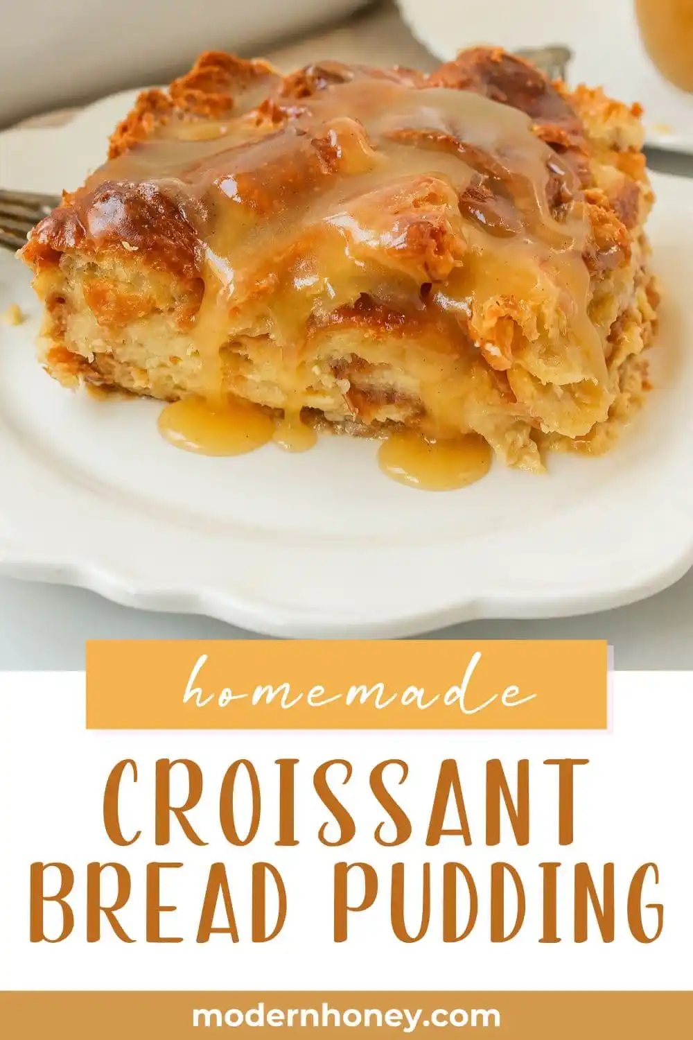 Croissant Bread Pudding with Vanilla Sauce is made with croissants baked in a custard sauce and topped with a homemade vanilla bean sauce. The most decadent dessert or breakfast recipe!