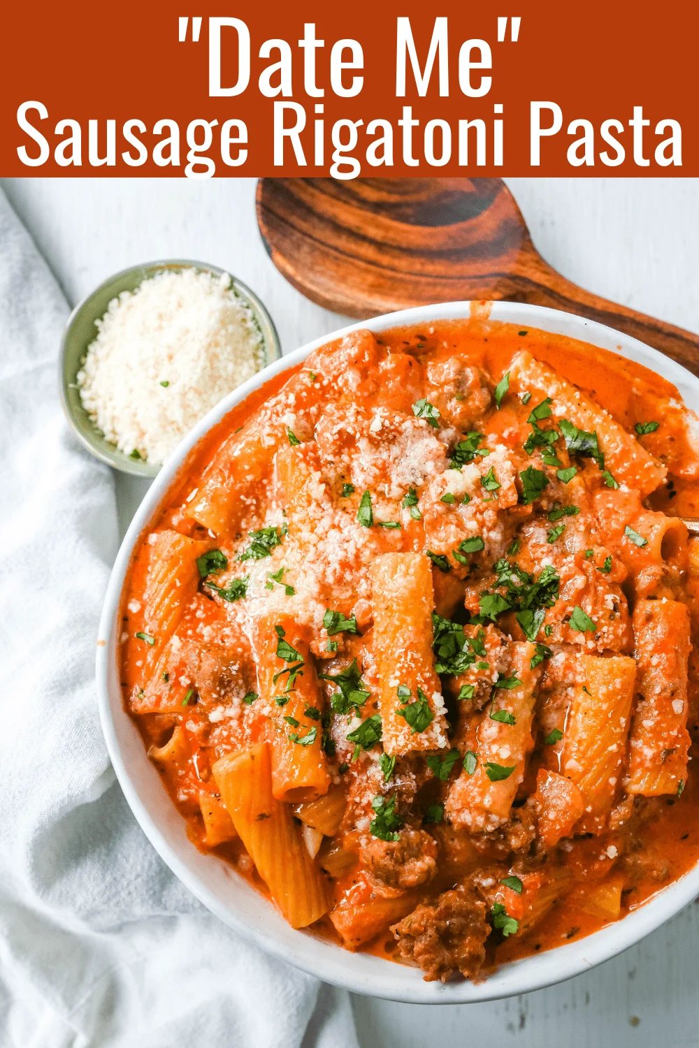 "Date Me" Creamy Sausage Rigatoni Pasta Homemade rich and creamy tomato cream and sausage sauce tossed with rigatoni and topped with parmesan cheese. The best creamy sausage rigatoni pasta! #pasta #dinner