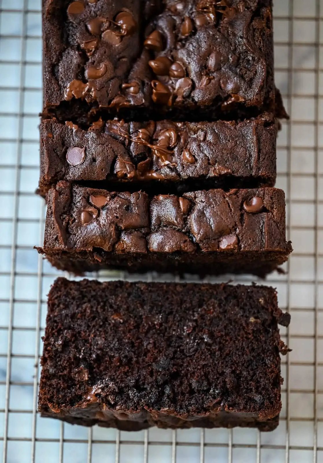 This easy double chocolate banana bread is rich, moist, and full of chocolate chips—the perfect chocolate banana bread recipe for using overripe bananas.