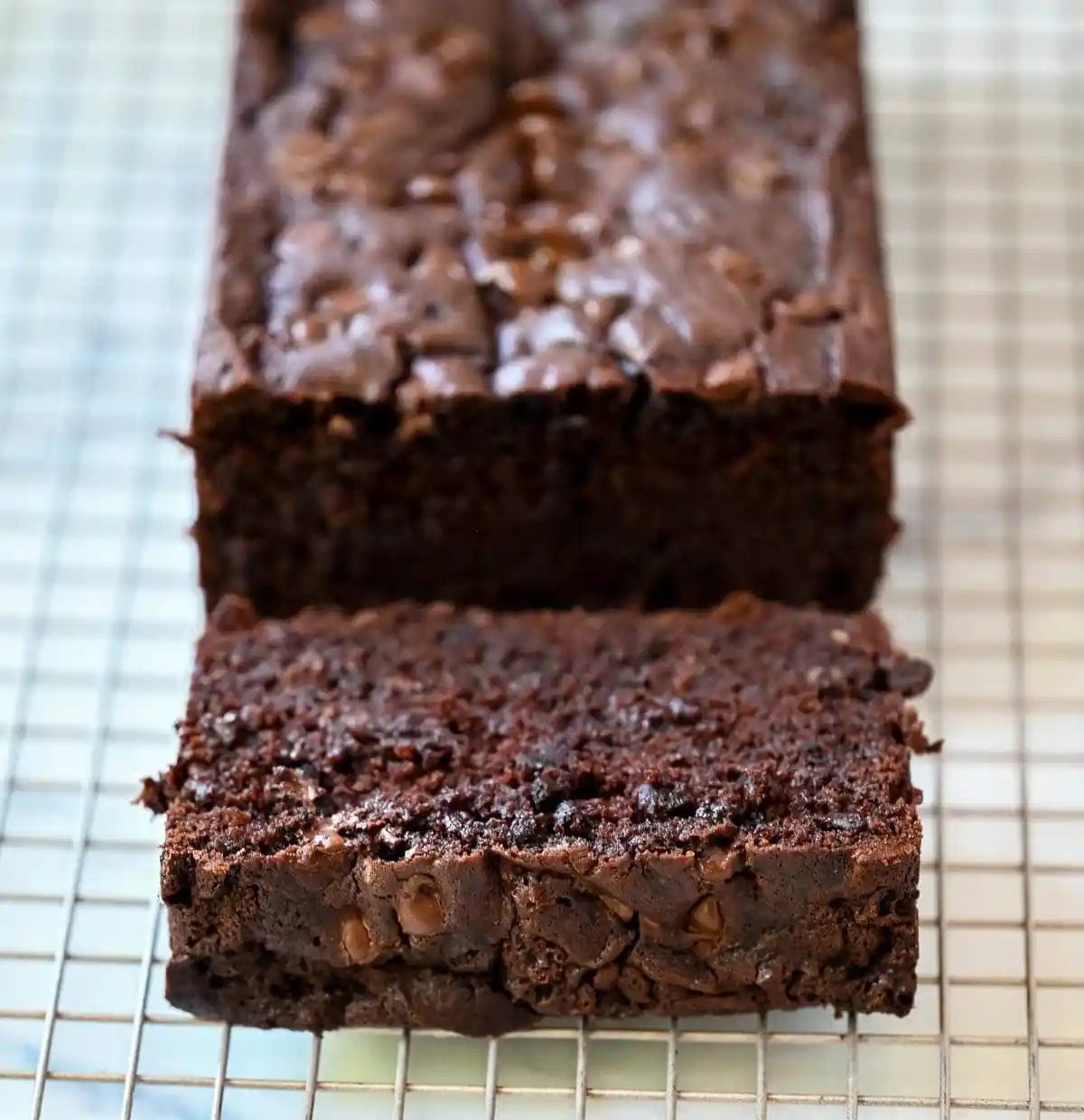 This easy double chocolate banana bread is rich, moist, and full of chocolate chips—the perfect chocolate banana bread recipe for using overripe bananas.