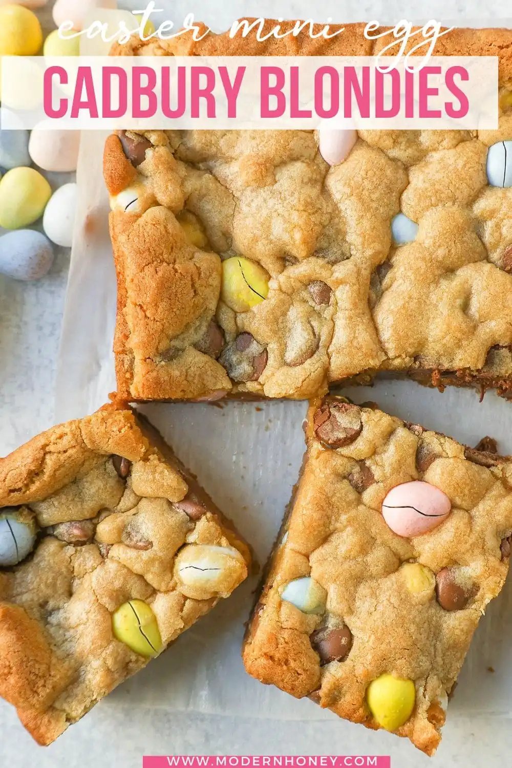 These Easter Cadbury Mini Eggs Blondies are chewy milk chocolate chip cookie bars filled with mini Cadbury eggs. These are the best mini egg blondies!