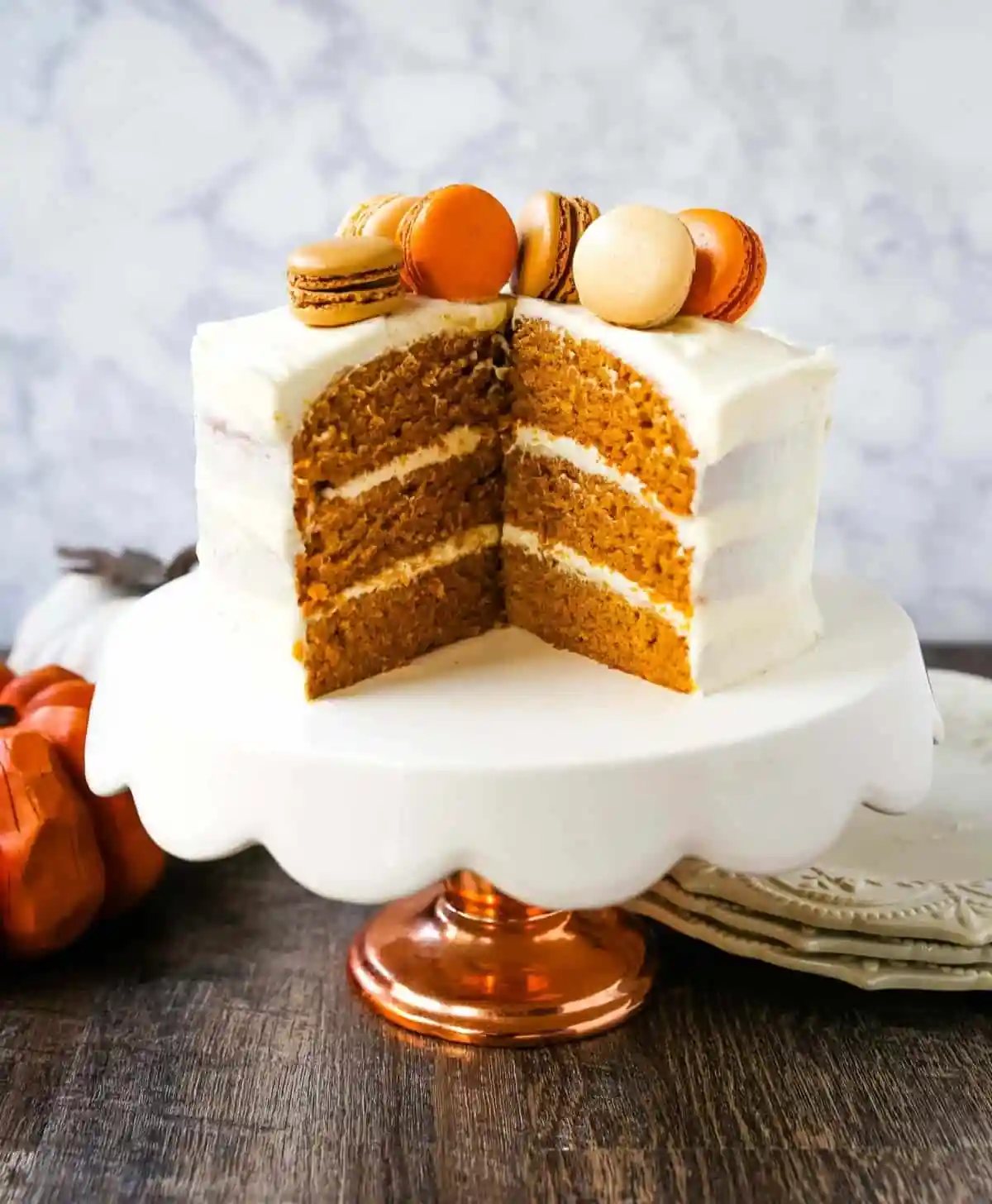 Pumpkin Cake with Cream Cheese Frosting Moist Pumpkin Spiced Cake with a Sweet Cream Cheese Frosting. The best Fall pumpkin layered cake recipe! www.modernhoney.com #pumpkin #pumpkinrecipes #fall #ffallrecipes #pumpkincake