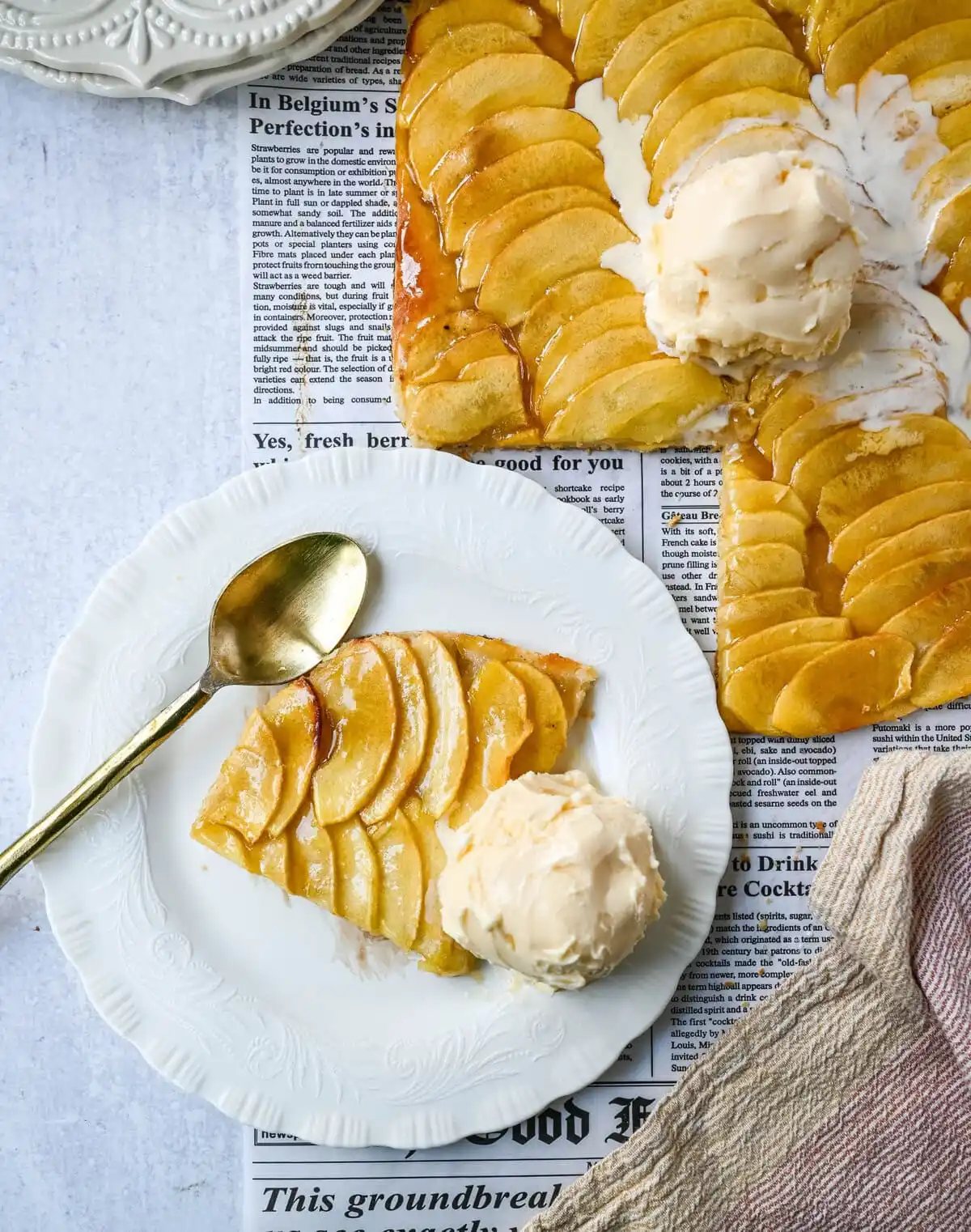 This homemade French Apple Tart recipe features a buttery crust, thinly sliced Granny Smith apples, and a golden apricot glaze for a bakery-style dessert. This Ina Garten French Apple Tart recipe is the best apple tart recipe, perfect for entertaining, holidays or any Fall baking.