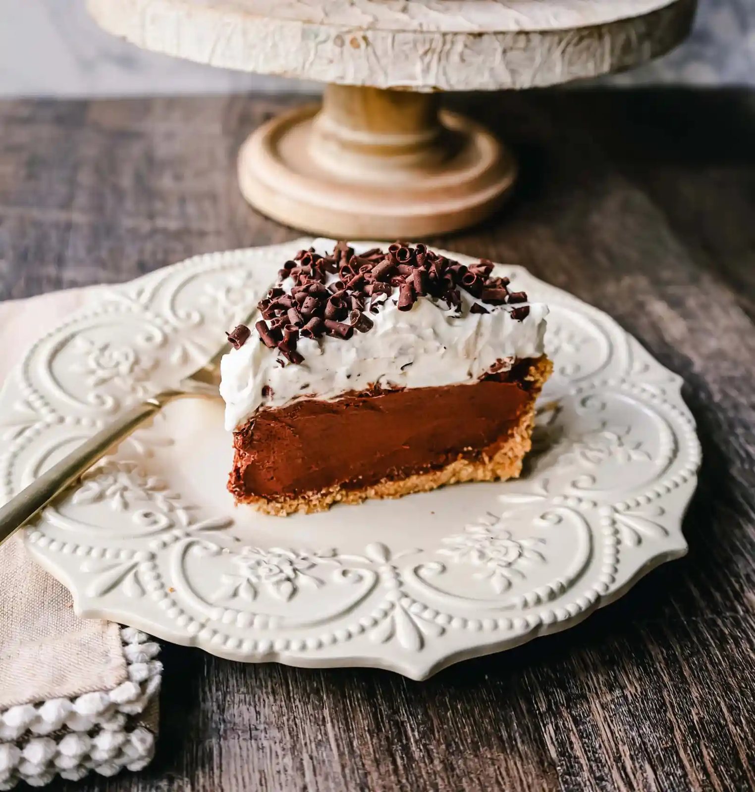 French Silk Pie Rich, creamy chocolate cream topped with fresh whipped cream and chocolate shaving all in a buttery graham cracker crust.