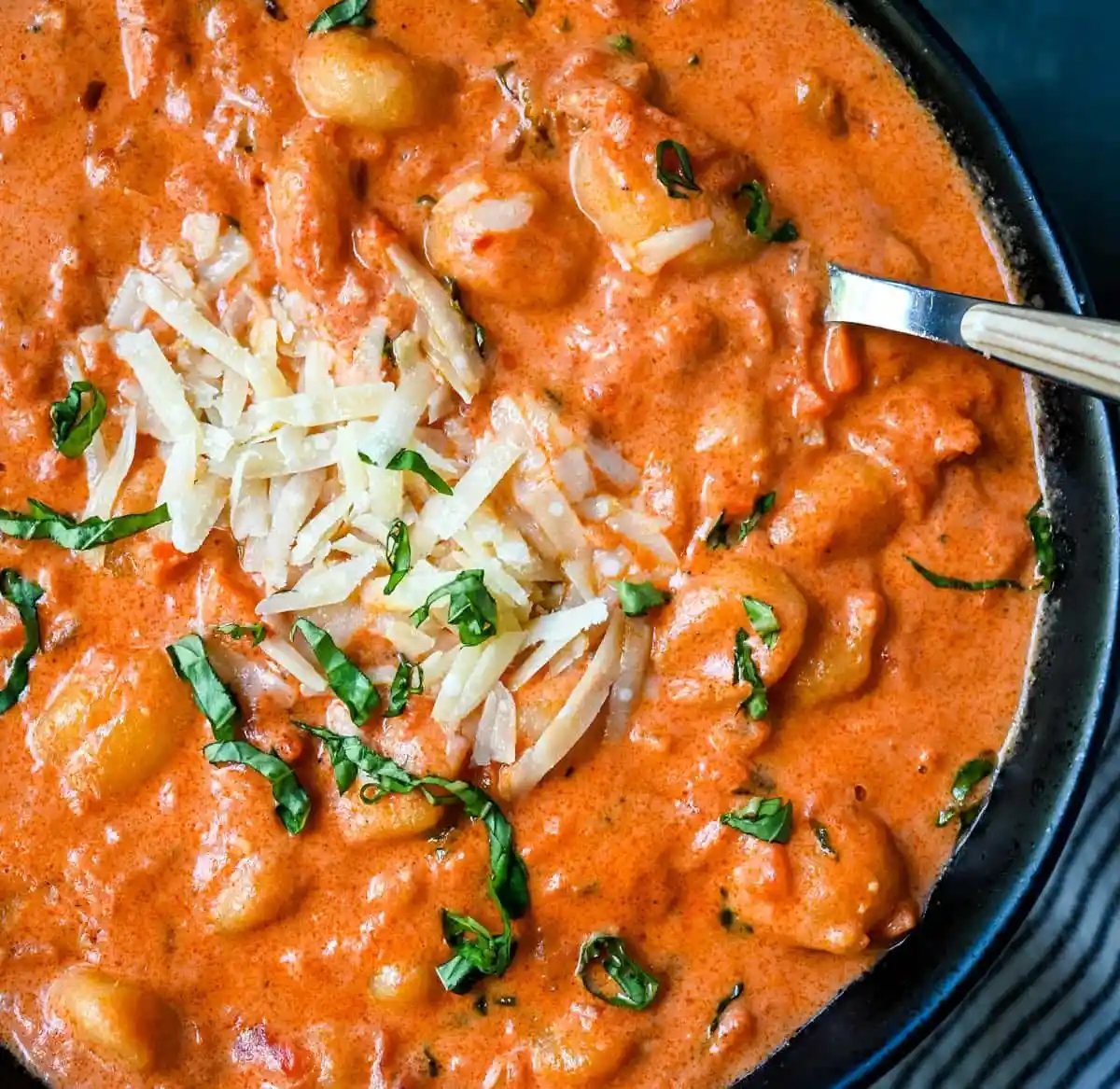 This easy Gnocchi alla Vodka combines soft, tender gnocchi with a silky, tomato-cream vodka sauce that’s bursting with garlic, parmesan, and fresh basil. This Gnocchi with Tomato Cream Sauce is an easy weeknight dinner but it tastes like it is straight out of an Italian restaurant.
