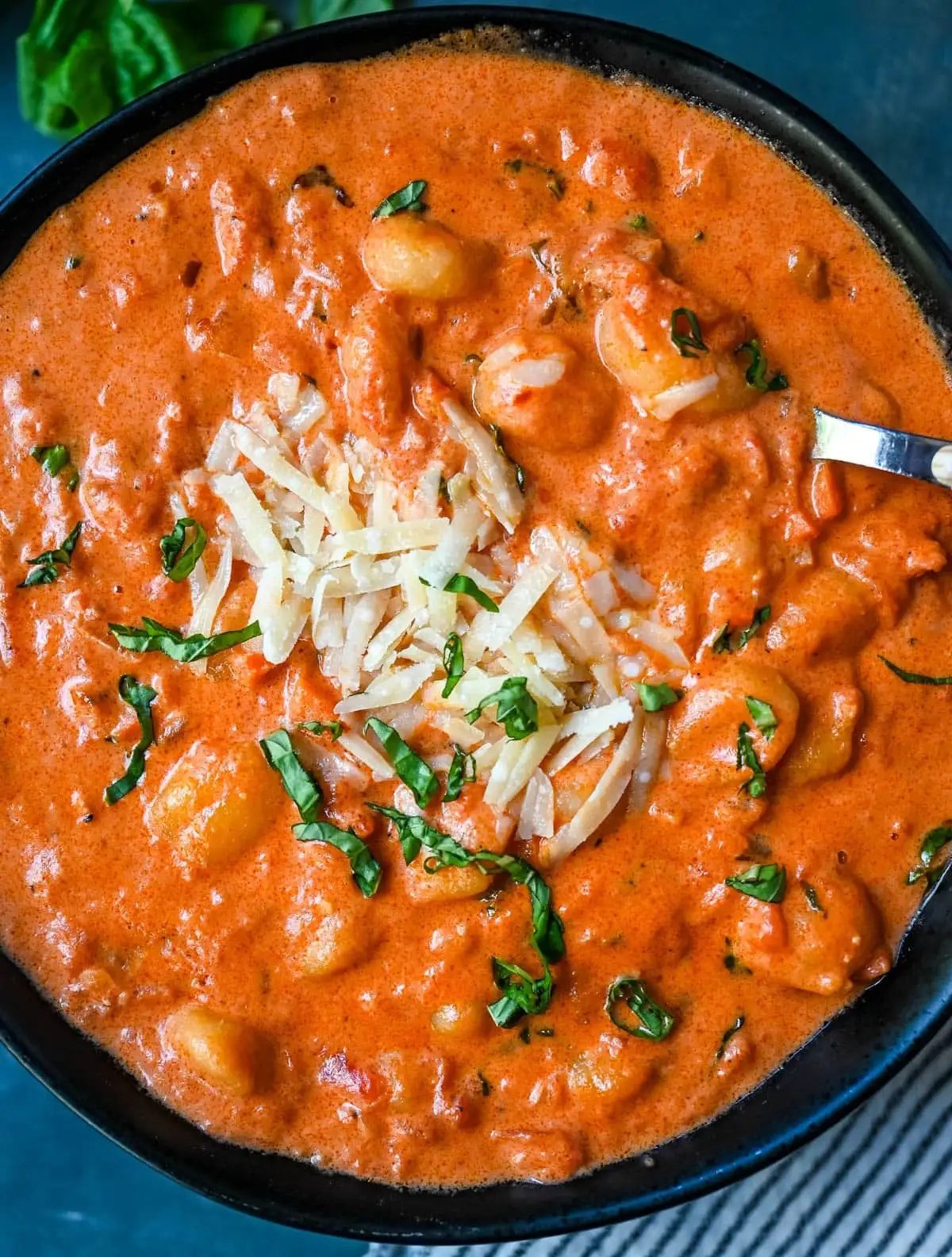 This easy Gnocchi alla Vodka combines soft, tender gnocchi with a silky, tomato-cream vodka sauce that’s bursting with garlic, parmesan, and fresh basil. This Gnocchi with Tomato Cream Sauce is an easy weeknight dinner but it tastes like it is straight out of an Italian restaurant.