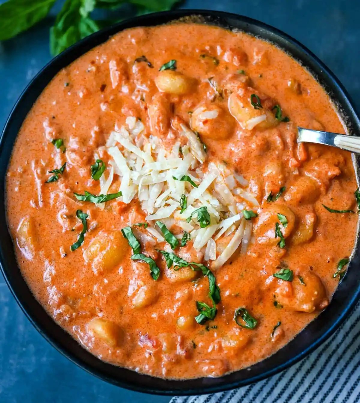 This easy Gnocchi alla Vodka combines soft, tender gnocchi with a silky, tomato-cream vodka sauce that’s bursting with garlic, parmesan, and fresh basil. This Gnocchi with Tomato Cream Sauce is an easy weeknight dinner but it tastes like it is straight out of an Italian restaurant.