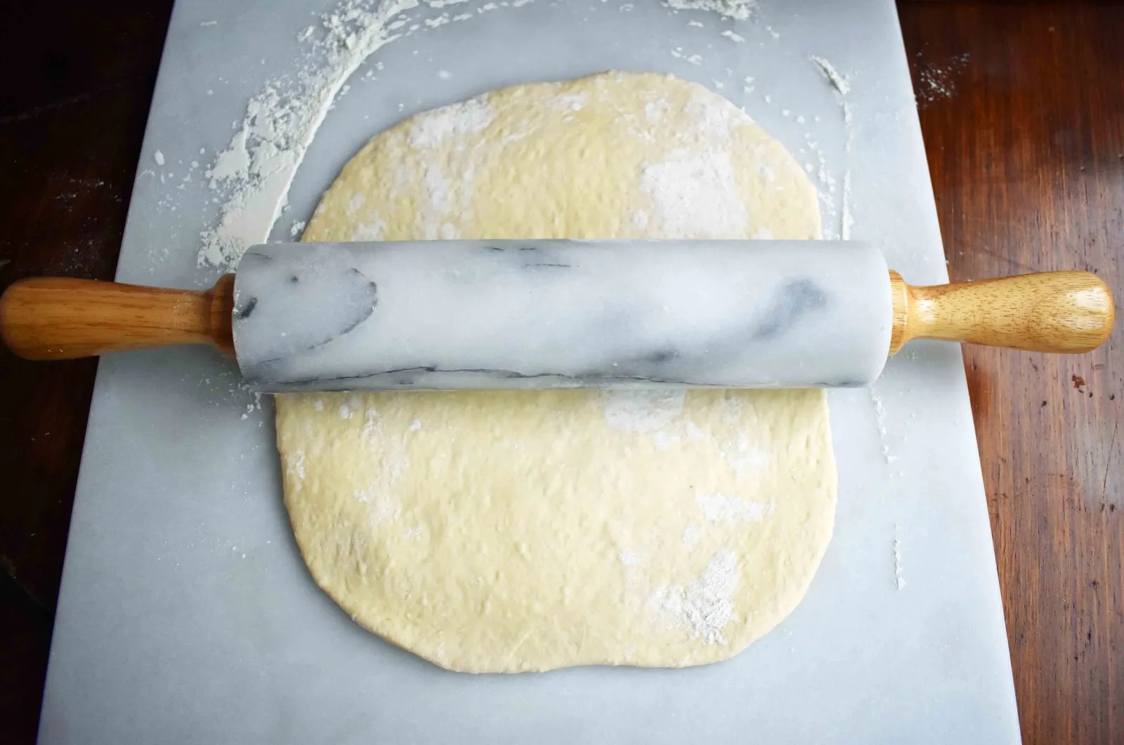 Golden's Garlic Parmesan Cheese Rolls by Modern Honey. Made with 5 simple ingredients -- pizza dough, butter, garlic powder, parmesan and mozzarella cheese.