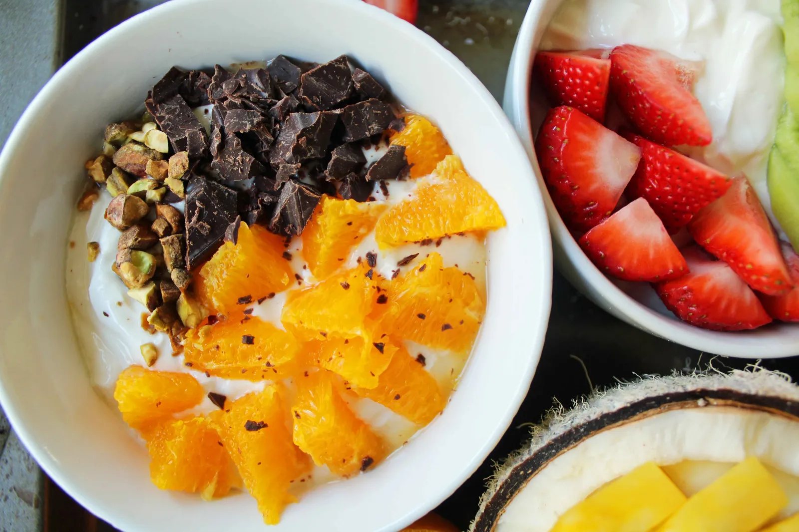 Greek Yogurt Breakfast Bowls with Toppings by Modern Honey. Healthy Greek Yogurt topped with fresh fruits, nuts, and honey. It's a perfect breakfast to start the day!
