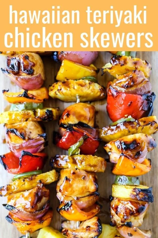 Hawaiian Teriyaki Chicken Skewers Grilled chicken skewers with peppers, onions, pineapple, and jalapeño basted in a sweet and salty teriyaki sauce and grilled to perfection. www.modernhoney.com #chickenskewers #chickenkabobs #teriyakichicken