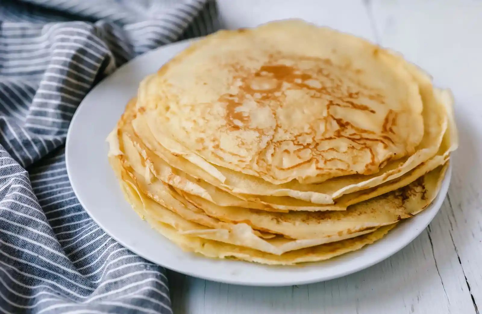 The Best Crepes Recipe. An easy homemade crepe recipe made with simple ingredients -- milk, flour, eggs, sugar, water, and butter. Simple 6-ingredient crepe recipe!