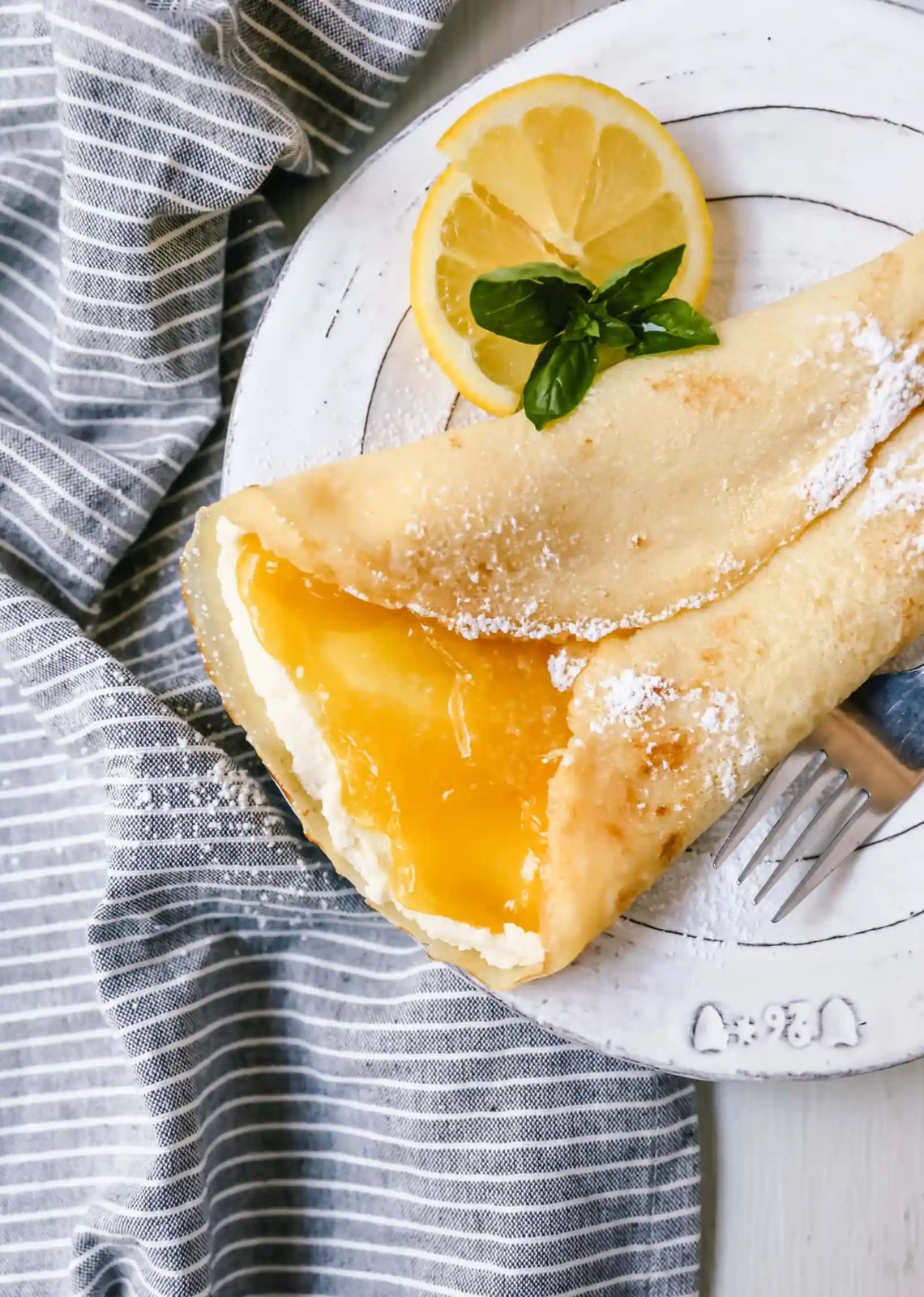 The Best Crepes Recipe. An easy homemade crepe recipe made with simple ingredients -- milk, flour, eggs, sugar, water, and butter. Simple 6-ingredient crepe recipe! #crepes #crepe #breakfast