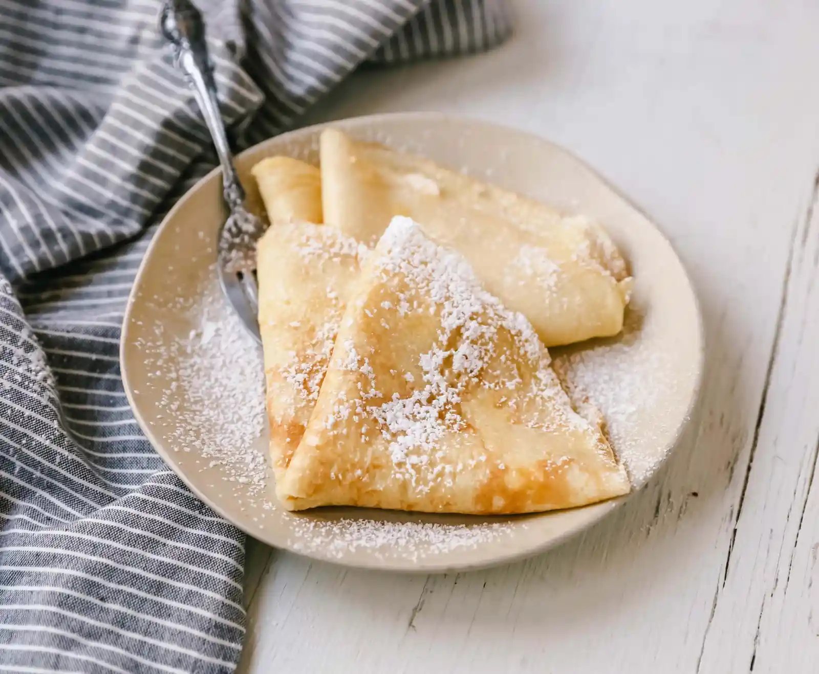 The Best Crepes Recipe. An easy homemade crepe recipe made with simple ingredients -- milk, flour, eggs, sugar, water, and butter. Simple 6-ingredient crepe recipe! #crepes #crepe #breakfast