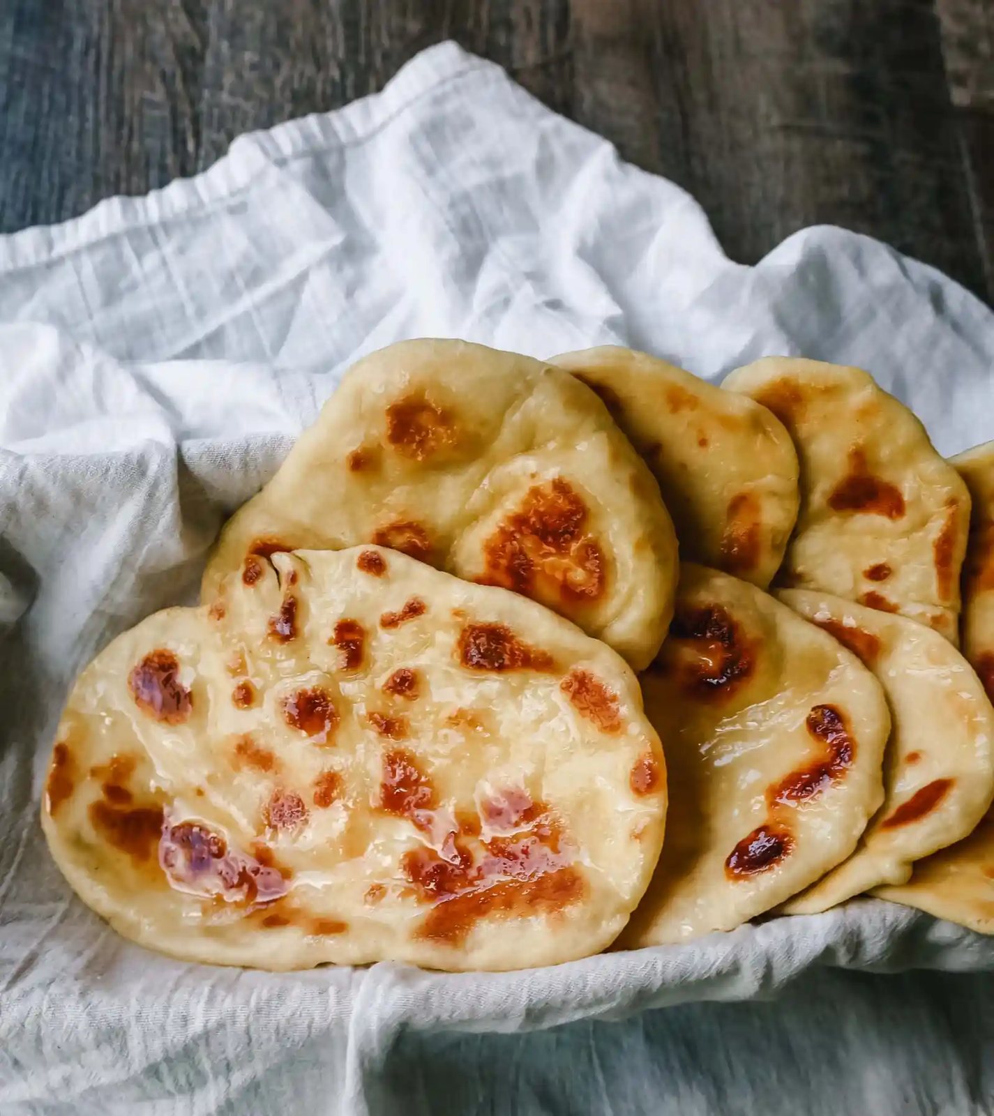 Homemade Naan Bread Light, fluffy, buttery homemade Naan bread that is even better than what you find in restaurants.