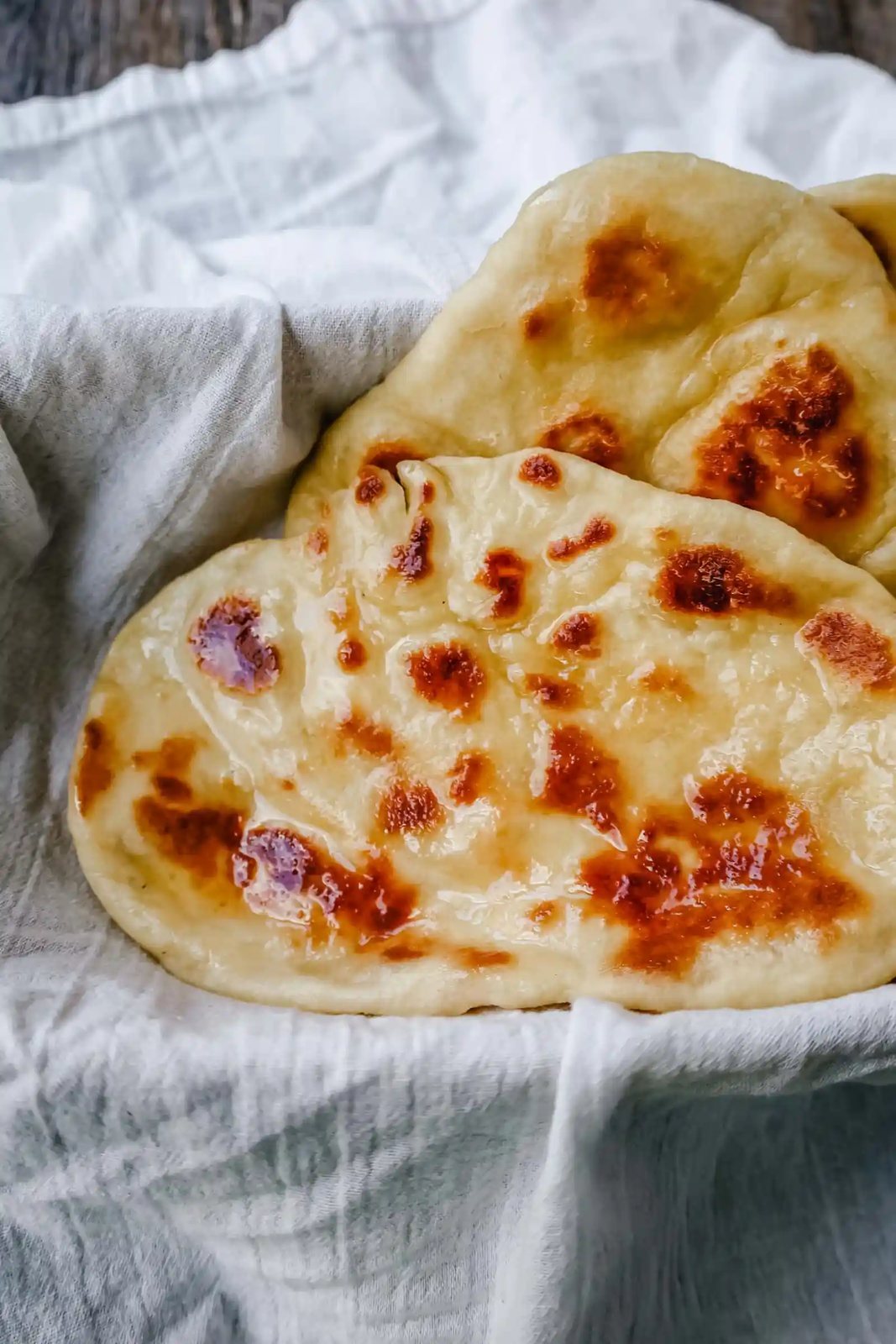 Homemade Naan Bread Light, fluffy, buttery homemade Naan bread that is even better than what you find in restaurants.