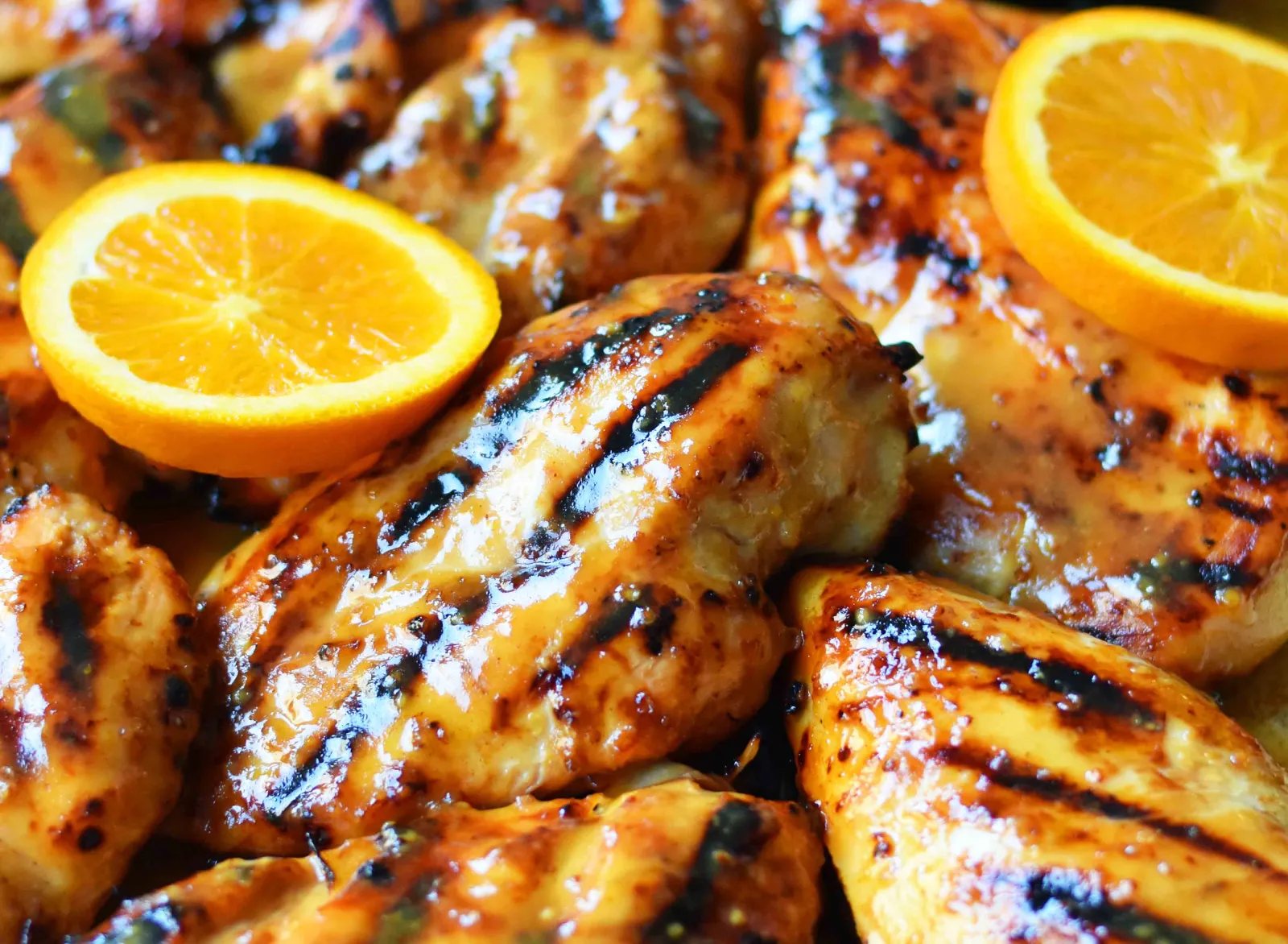 Honey Mustard Grilled Chicken. How to make sweet and tangy grilled honey mustard chicken. A honey mustard marinade and sauce in one! The perfect chicken for your summer BBQ. www.modernhoney.com #honeymustard #honeymustardchicken