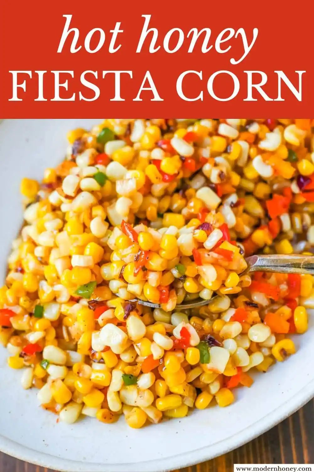 This Hot Honey Skillet Corn recipe is an easy and flavorful side dish made with sweet corn, peppers, onions, and spicy hot honey. It’s a quick corn recipe that's ready in under 20 minutes and pairs perfectly with roasted turkey or chicken.