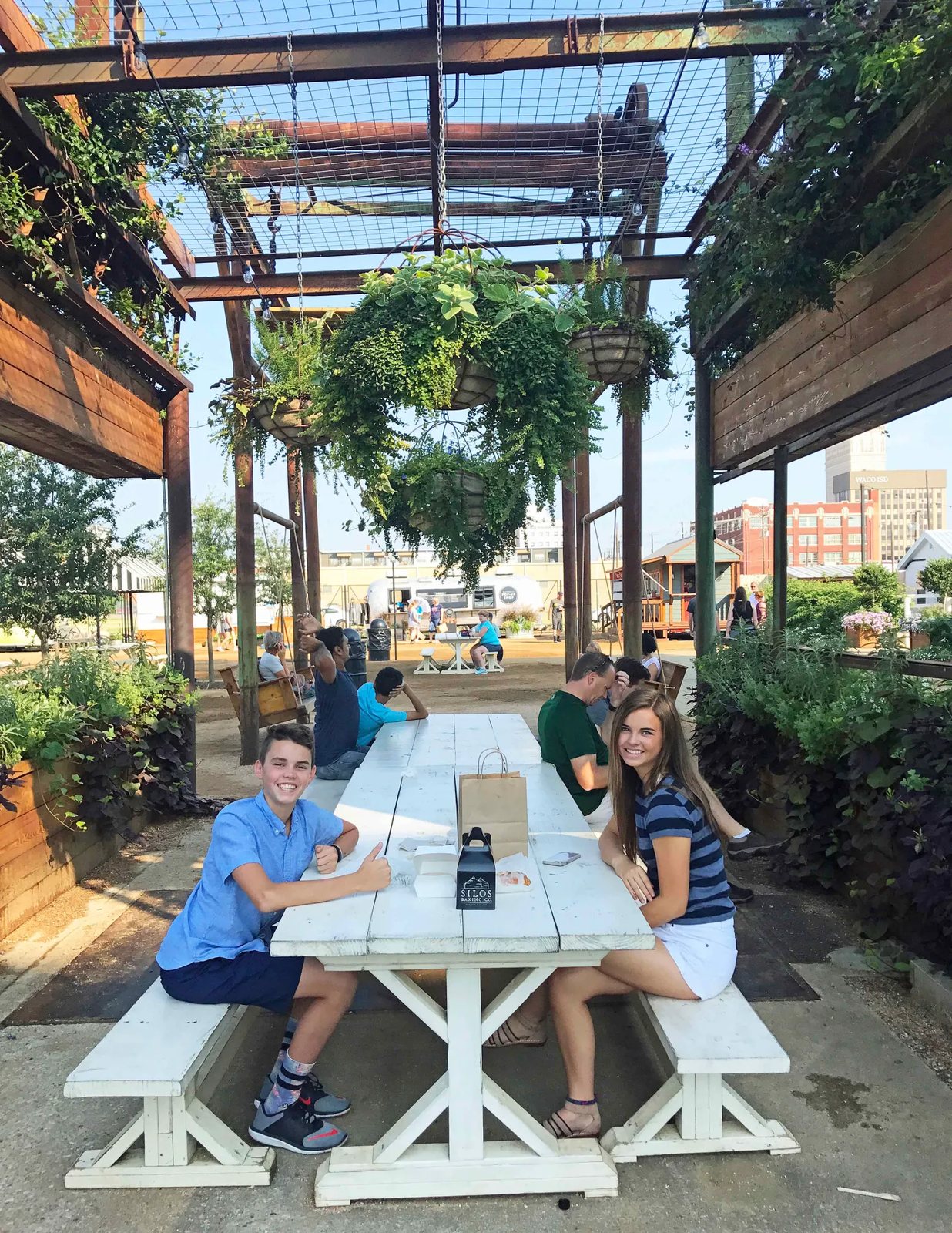 How to plan the perfect trip to Magnolia Market at the Silos in Waco Texas. Magnolia Market was created by HGTV's Fixer Upper favorite couple, Chip and Joanna Gaines. Visit Magnolia Market, Silo Baking Co. and the beautiful grounds. Tips for planning a trip to Magnolia Market. www.modernhoney.com
