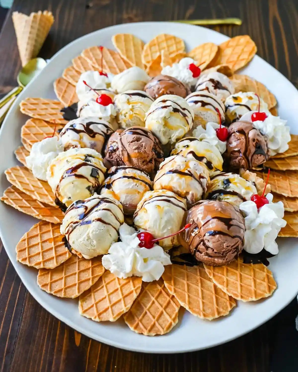 Ice cream nachos are a yummy dessert that combines the crunch of waffle cone pieces with scoops of your favorite ice cream, topped with a variety of delicious toppings like chocolate fudge, caramel, whipped cream, and cherries. This fun and creative ice cream treat is perfect for sharing!
