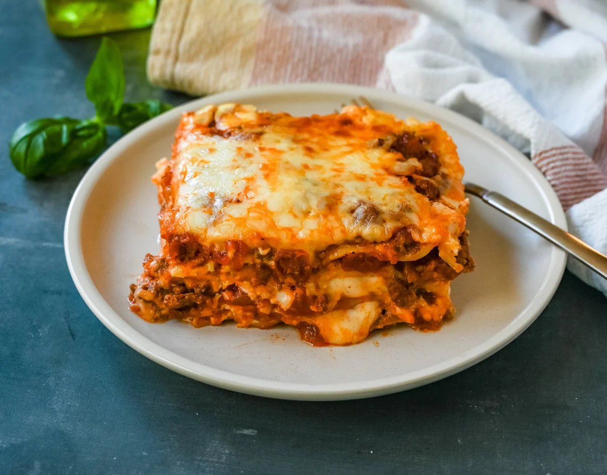 The Best Lasagna Recipe. This Italian Bolognese Lasagna is made with a creamy bechamel sauce with layers of meat sauce and cheese. This homemade lasagna is the best lasagna recipe!