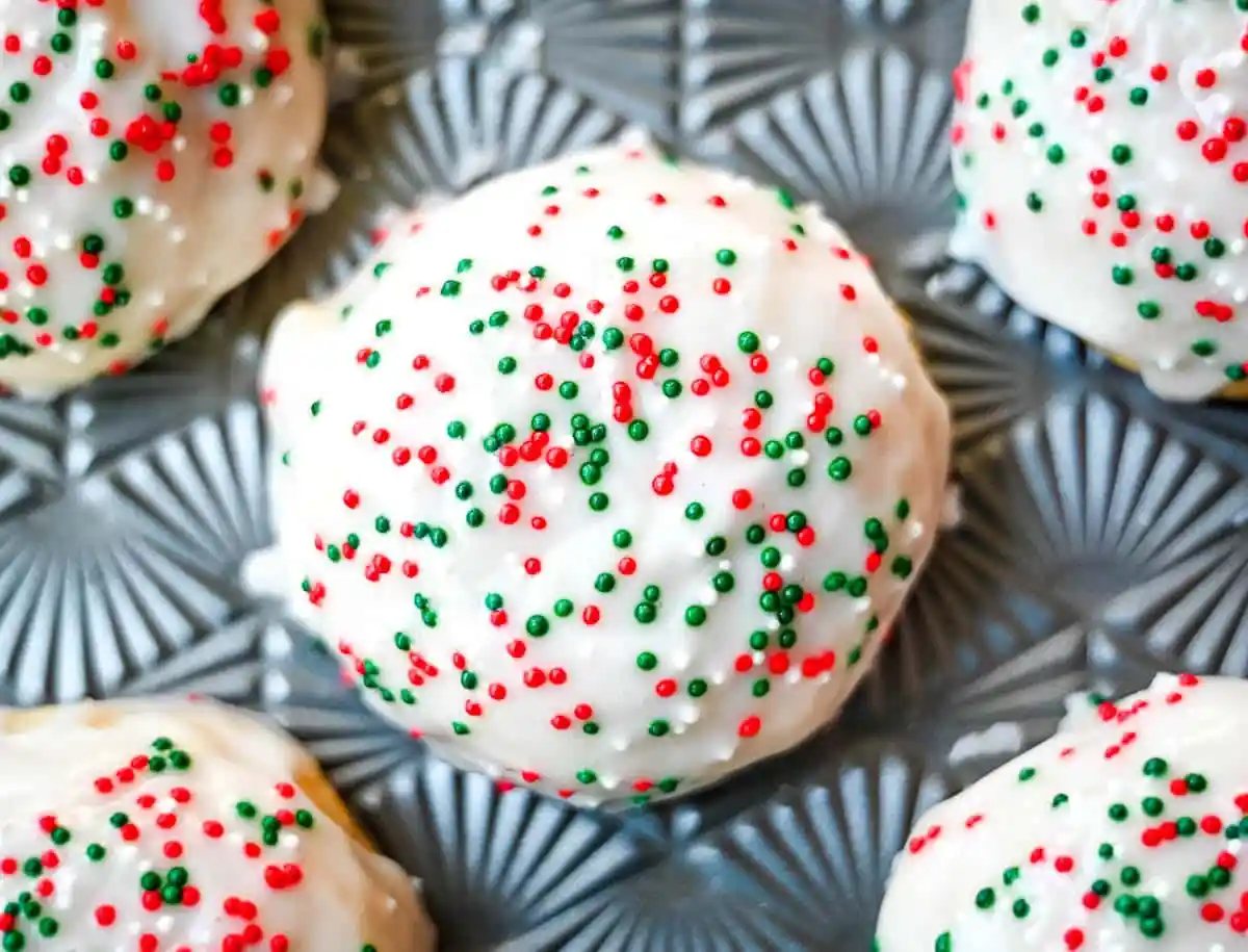Italian ricotta cookies are one of the most popular Italian Christmas cookies, loved for their melt-in-your-mouth, soft texture. These holiday cookies are topped with a sweet glaze and colorful sprinkles, making them a perfect addition to any Christmas cookie platter. Ricotta cookies capture the flavor of classic Italian holiday baking. Whether you’re hosting a Christmas party or sharing homemade gifts, these easy Christmas cookies are guaranteed to stand out on every dessert table.