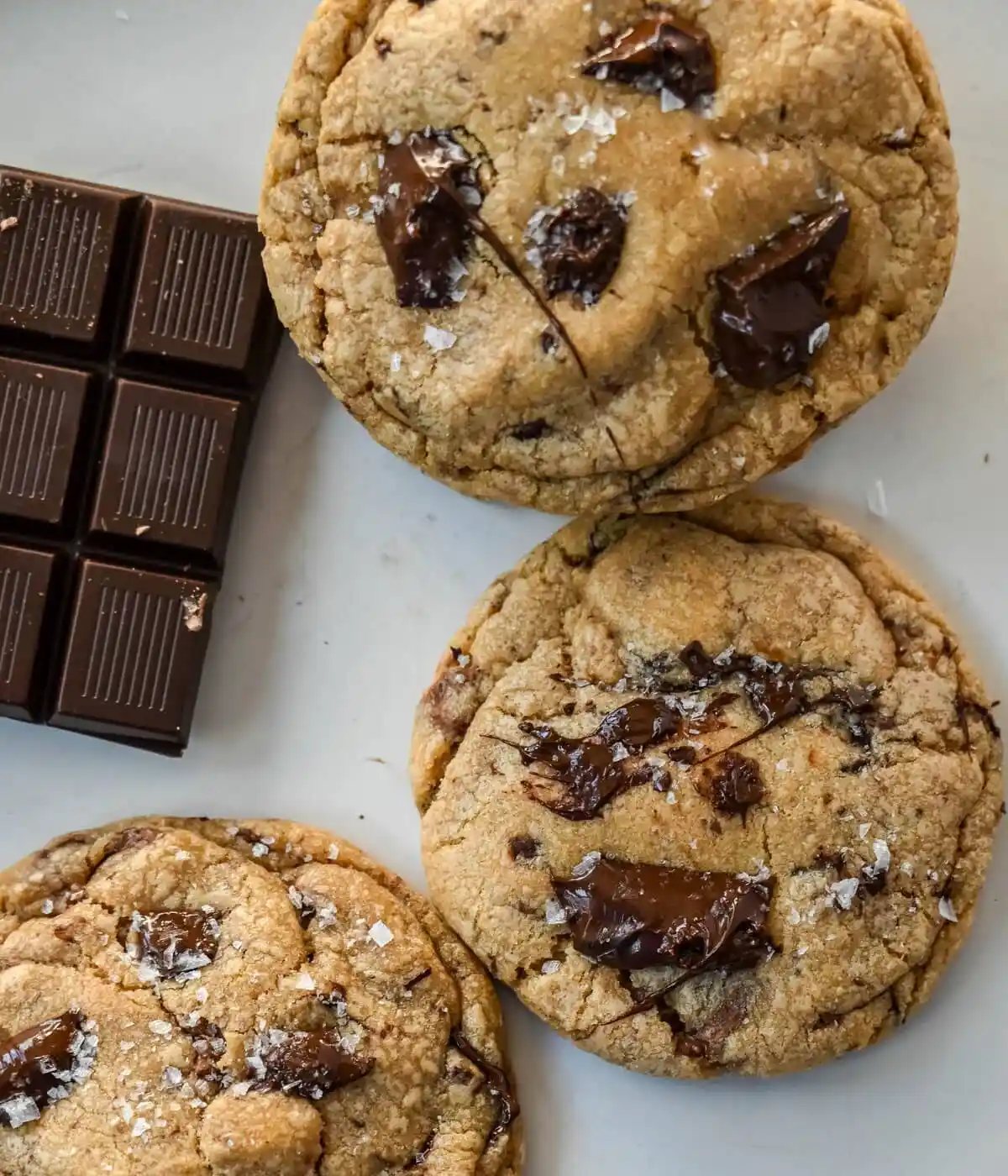 These famous Jacques Torres chocolate chip cookies are soft and chewy, and loaded with bittersweet chocolate discs. With golden edges, a soft center, and a sprinkle of sea salt on top, they’re the ultimate bakery-style chocolate chip cookies you can make at home. These are the New York Times top rated #1 chocolate chip cookie recipe.