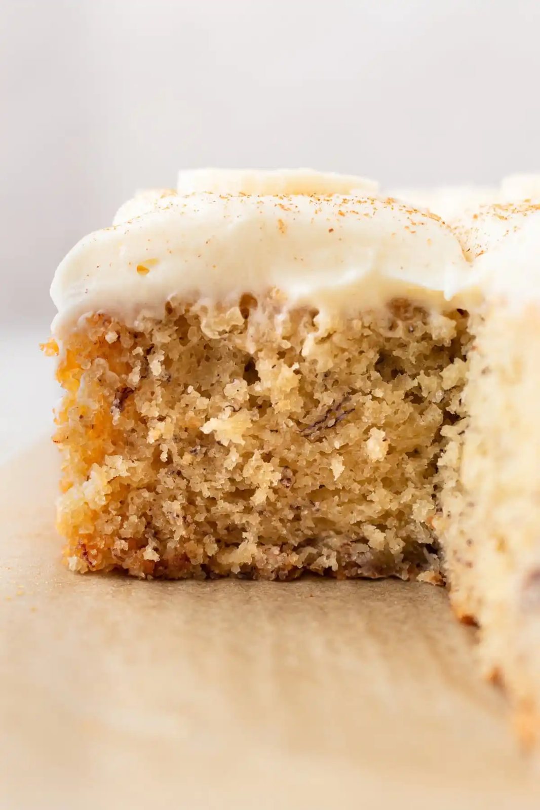 Jeff's BEST Banana Cake Recipe is a moist and tender banana cake with a creamy, sweet, and buttery cream cheese frosting. Some say it is the best banana cake in the world! This moist banana cake with cream cheese frosting is baked in a 9×13 pan and is always a hit!