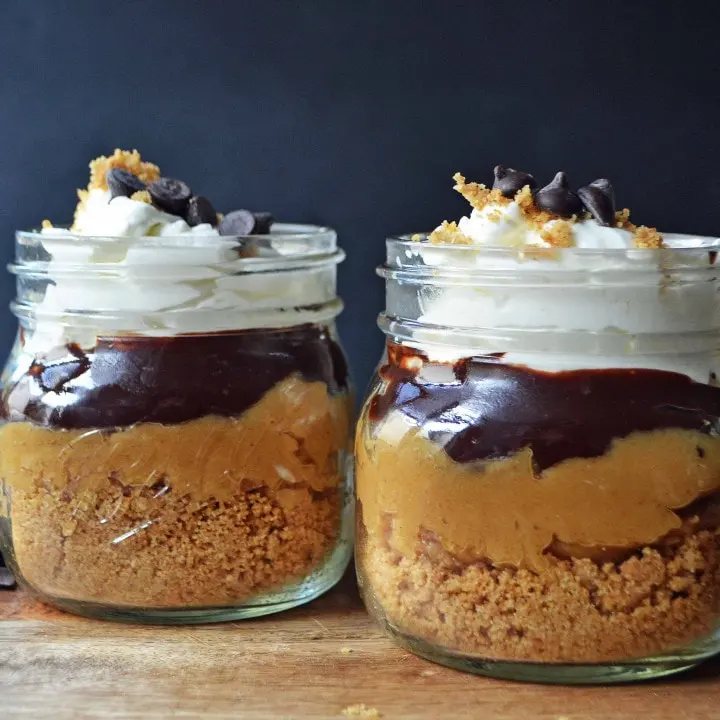 The Eligible Bachelor Peanut Butter Pie Jars by Modern Honey l Graham Cracker Crust, Peanut Butter Cream, Chocolate Ganache, and Homemade Whipped Cream