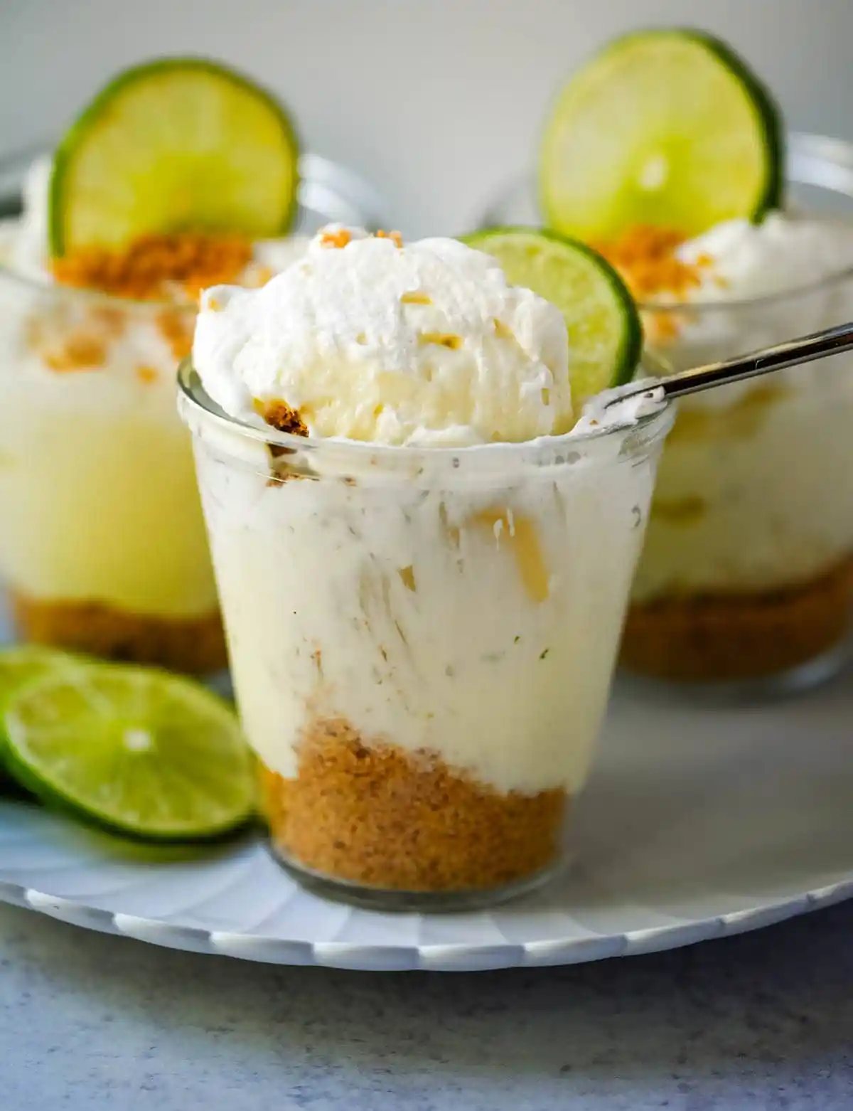 These key lime pie jars are a fresh, creamy twist on the classic key lime pie, made with layers of buttery graham cracker crust, tangy key lime filling, and fluffy whipped cream. Served in individual jars, they are perfect for entertaining or grab-and-go desserts.