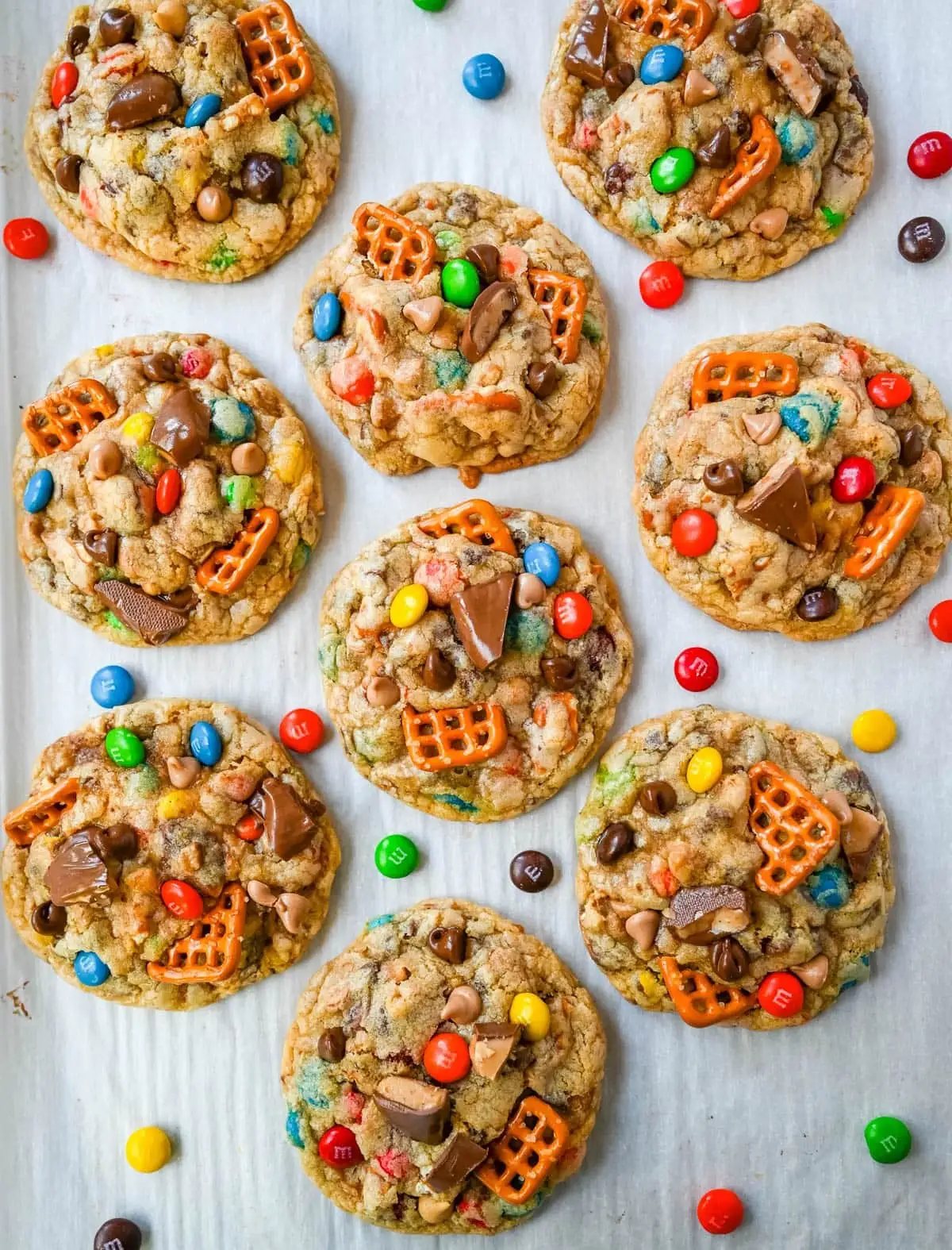 These Kitchen Sink Cookies are thick, soft, and chewy bakery-style cookies packed with chocolate chips, colorful M&M’s, crunchy pretzels, buttery toffee bits, and gooey caramel or peanut butter chips. Every bite is sweet, salty, crunchy, and chocolatey all at once. They’re called “kitchen sink” cookies because you can throw in everything but the kitchen sink, making them one of the most versatile and fully loaded cookie recipes you’ll ever bake.
