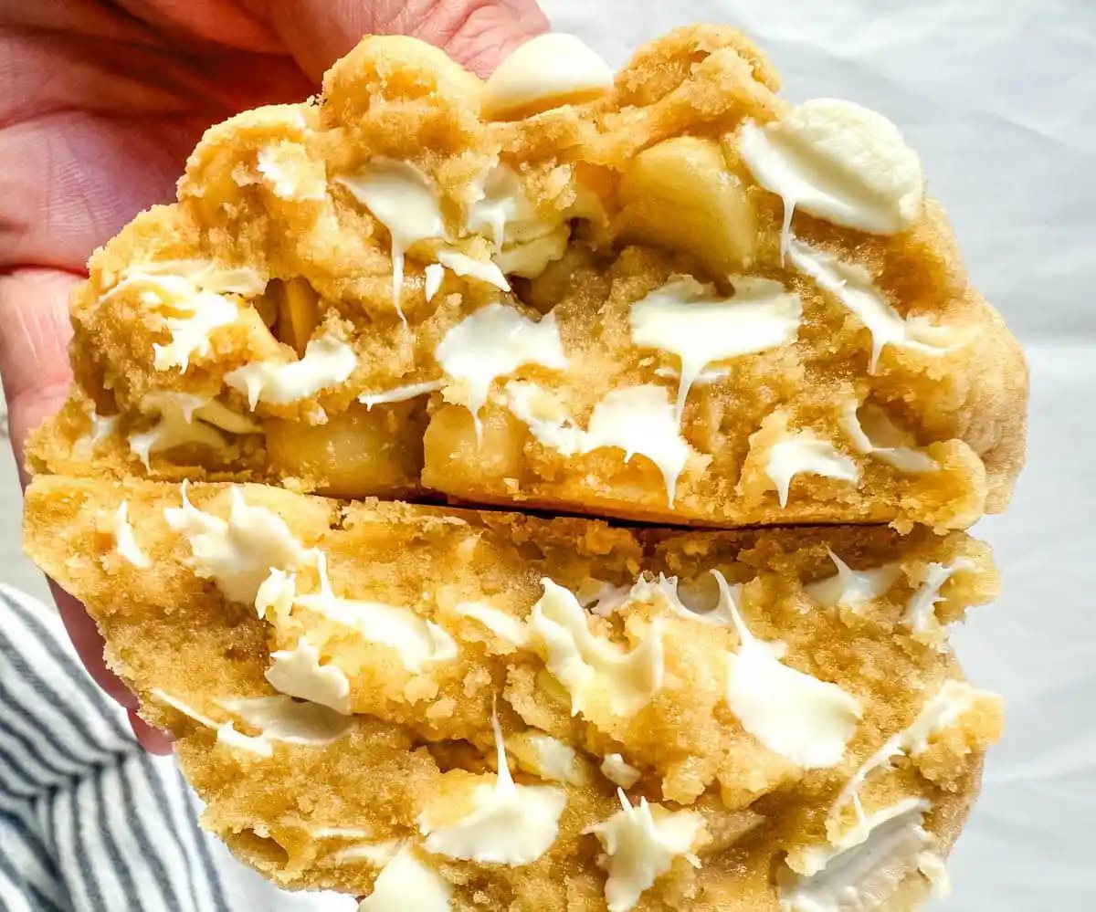 Soft in the center and crisp on the edges, these Levain Bakery White Chocolate Macadamia Cookies taste straight out of the bakery. This White Chocolate Macadamia Nut cookie recipe creates thick, buttery cookies loaded with creamy white chocolate chips and toasted macadamia nuts.