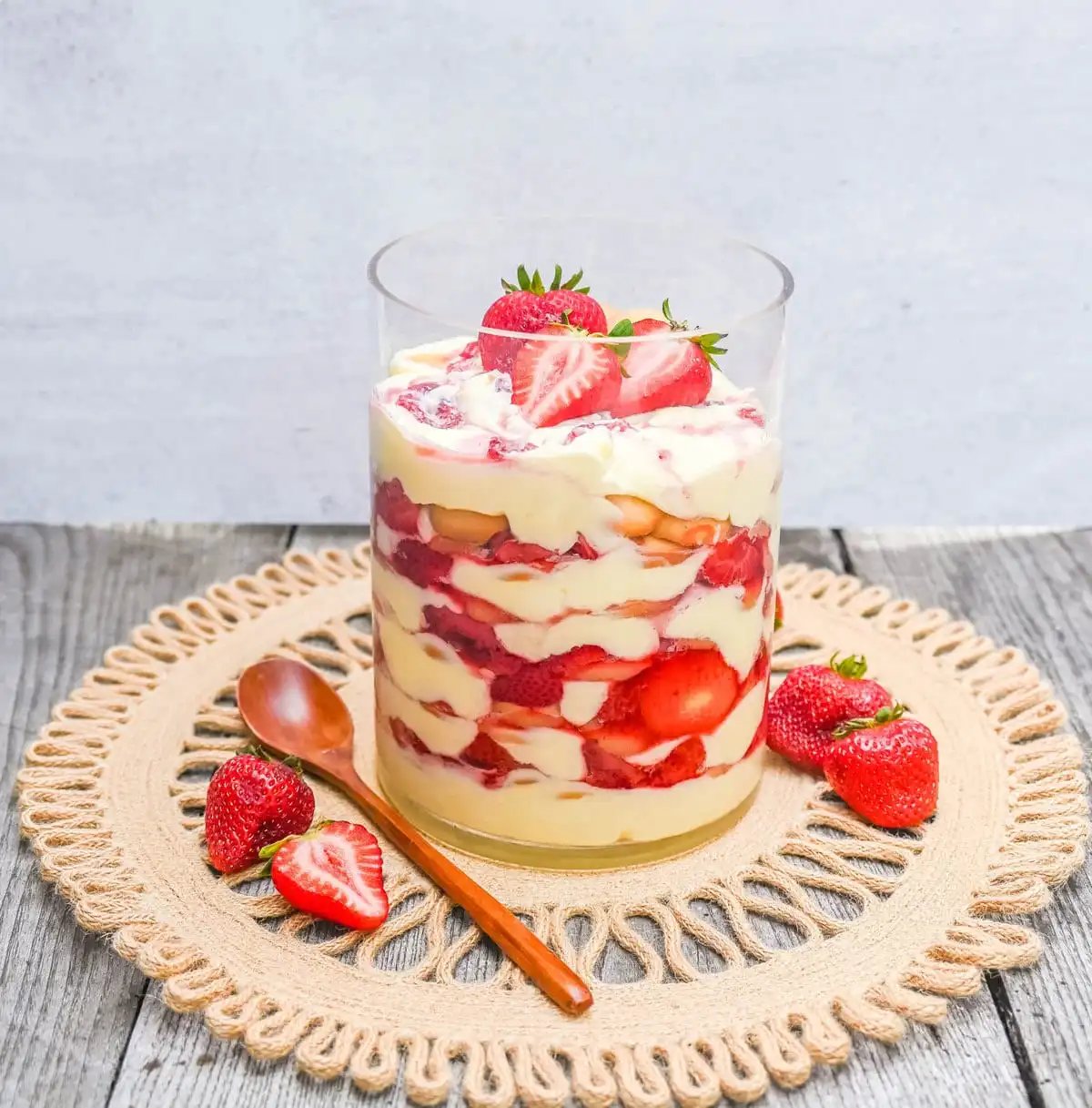 This Magnolia Bakery Strawberry Shortcake Pudding is such a quintessential summer dessert. It is made with fresh or roasted strawberries in a creamy vanilla pudding and whipped cream with Nilla wafers. This Strawberry Shortcake Pudding will be your favorite no-bake summer dessert recipe. This strawberry trifle will be a hit!