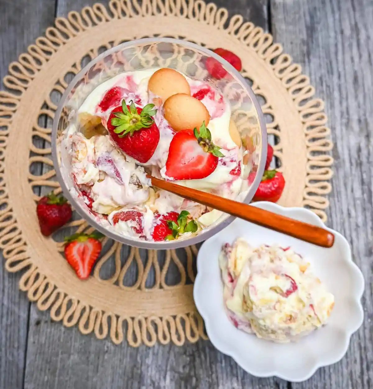 This Magnolia Bakery Strawberry Shortcake Pudding is such a quintessential summer dessert. It is made with fresh or roasted strawberries in a creamy vanilla pudding and whipped cream with Nilla wafers. This Strawberry Shortcake Pudding will be your favorite no-bake summer dessert recipe. This strawberry trifle will be a hit!