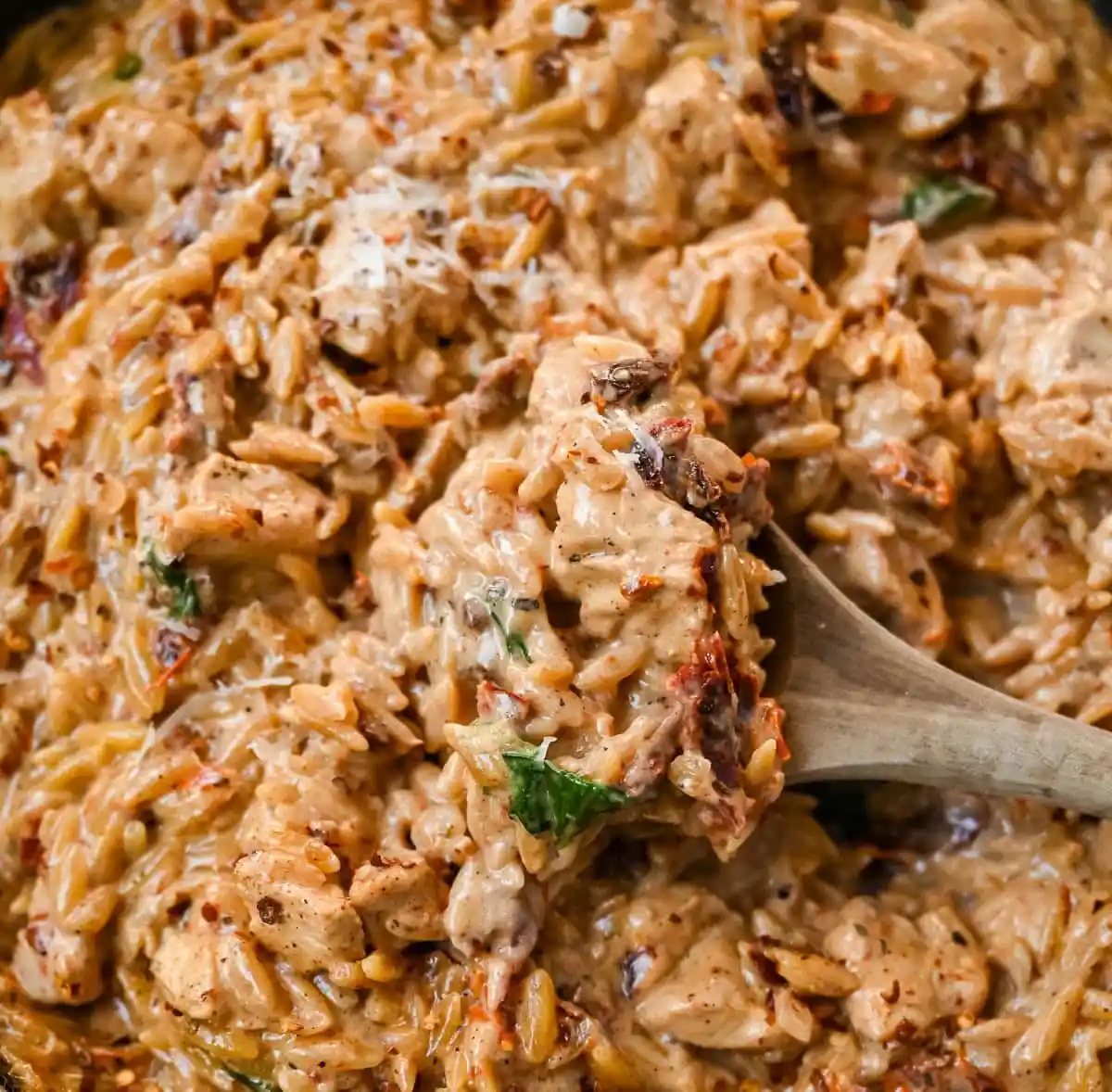 This Marry Me Chicken Orzo is a creamy, one-pan dinner made with tender chicken, sun-dried tomatoes, parmesan, and perfectly cooked orzo pasta. Inspired by the viral “marry me chicken” recipe, this version adds orzo to soak up the rich garlic cream sauce for an easy comfort meal.