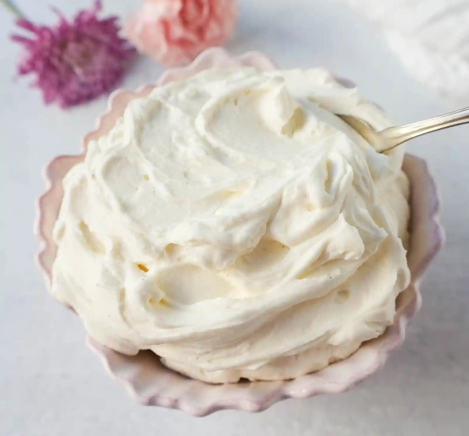 Creamy mascarpone cream is the most delicious and luxurious cake filling, dessert filling, or the perfect spread on any dessert. It is made with heavy cream, mascarpone cheese, powdered sugar, and vanilla or almond extract.