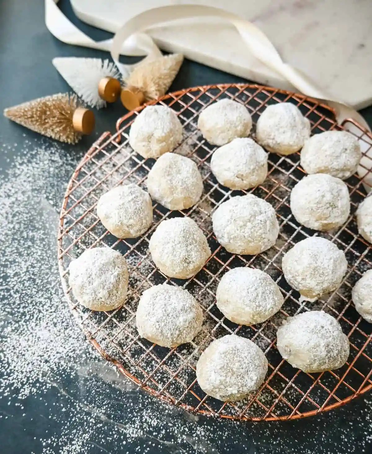 Mexican Wedding Cookies (Snowball Cookies). These buttery, nutty, Mexican wedding cookies are so easy to make and call for only 5 ingredients. These melt-in-your-mouth cookies are perfect to make during the holidays and everyone loves them. The perfect Christmas cookie recipe.
